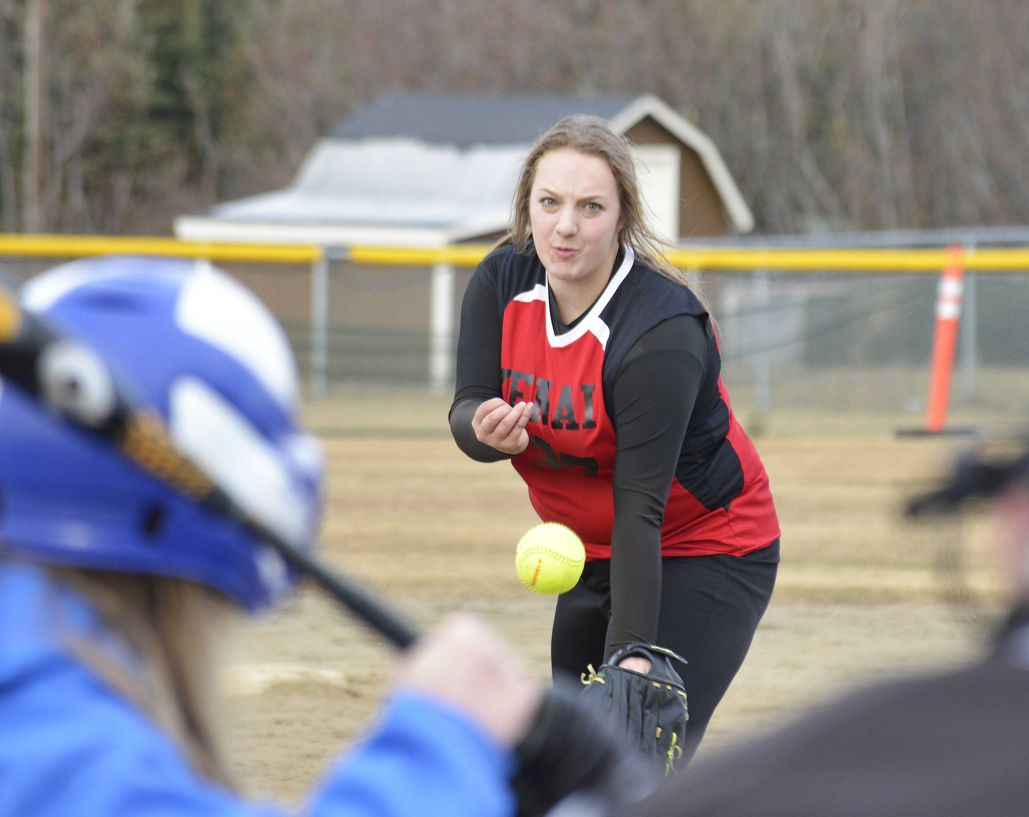 Kenai Central pitcher Savannah Jones delivers a strike to a Palmer batter April 2017 at Steve Shearer Memorial Ball Park in Kenai. (Photo by Joey Klecka/Peninsula Clarion)