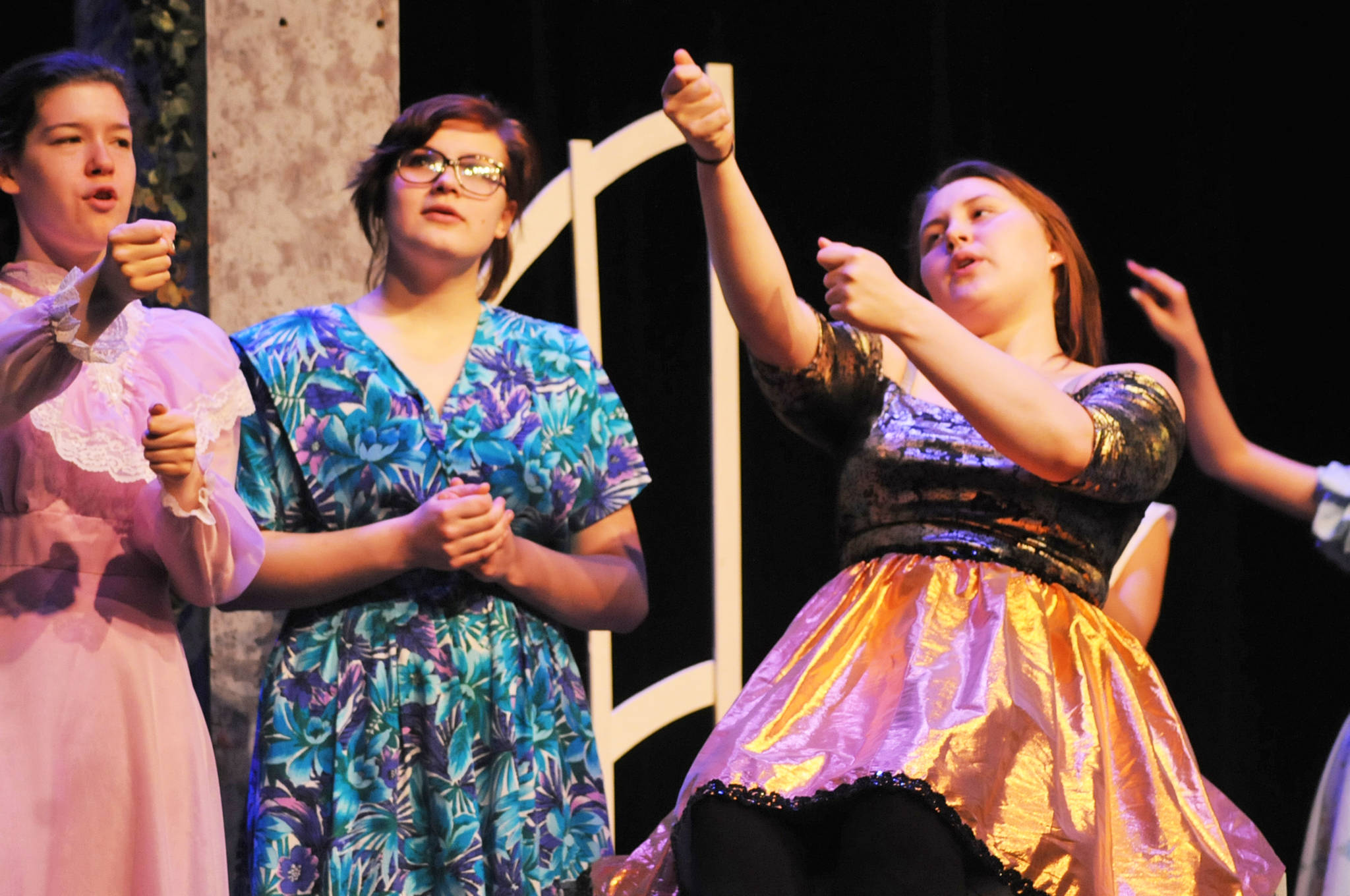 Actors sing a number during a dress rehearsal for Nikiski Middle-High School’s production of “Mary Poppins” on Monday, April 23, 2018 in Nikiski, Alaska. The play premiers Friday at 7 p.m. at the high school. Tickets are $15. (Photo by Elizabeth Earl/Peninsula Clarion)