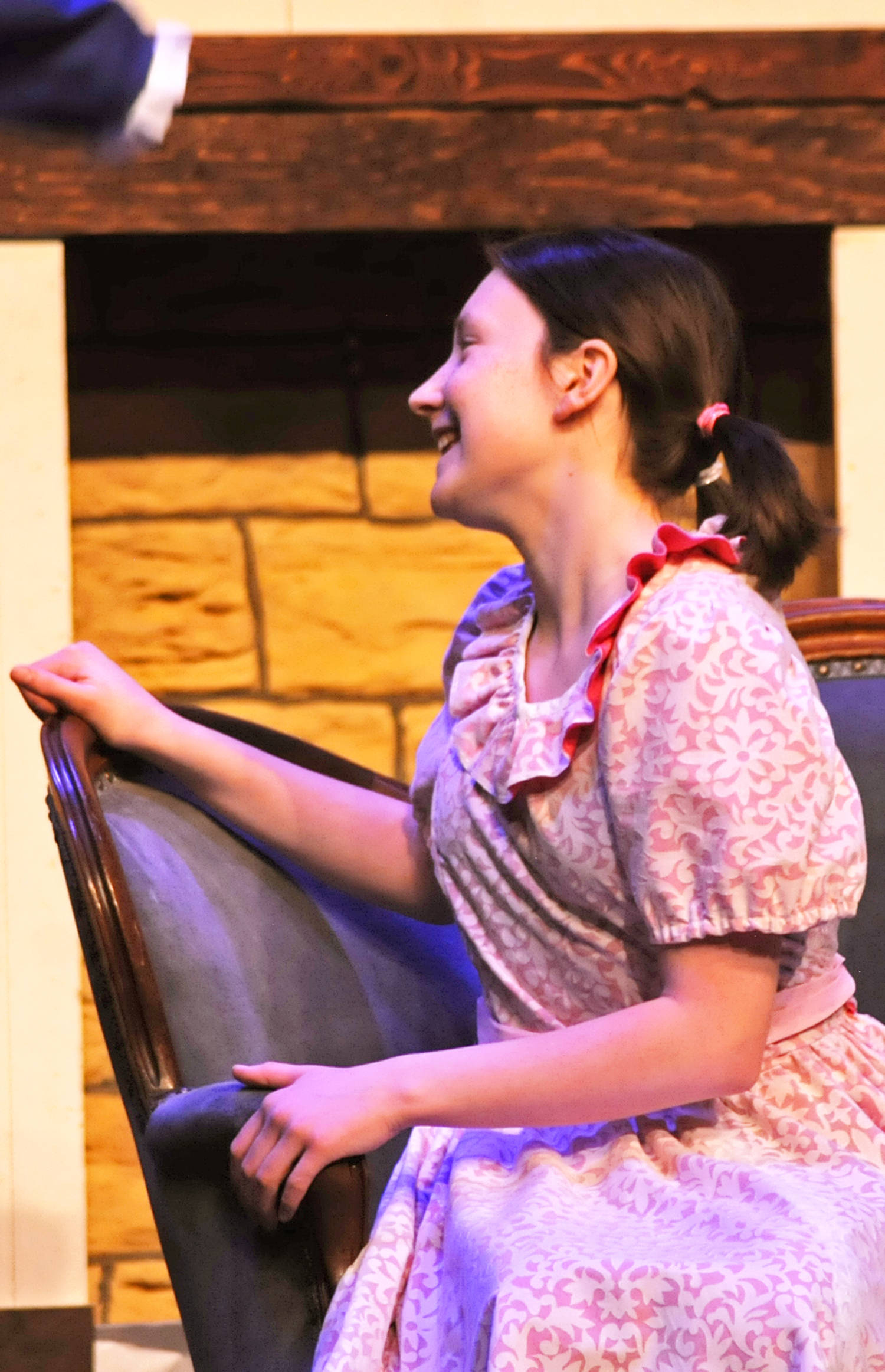 Jane Banks (played by Leora McCaughey) waits for a scene to start during a dress rehearsal for Nikiski Middle-High School’s production of “Mary Poppins” on Monday, April 23, 2018 in Nikiski, Alaska. The play premiers Friday at 7 p.m. at the high school. Tickets are $15. (Photo by Elizabeth Earl/Peninsula Clarion)