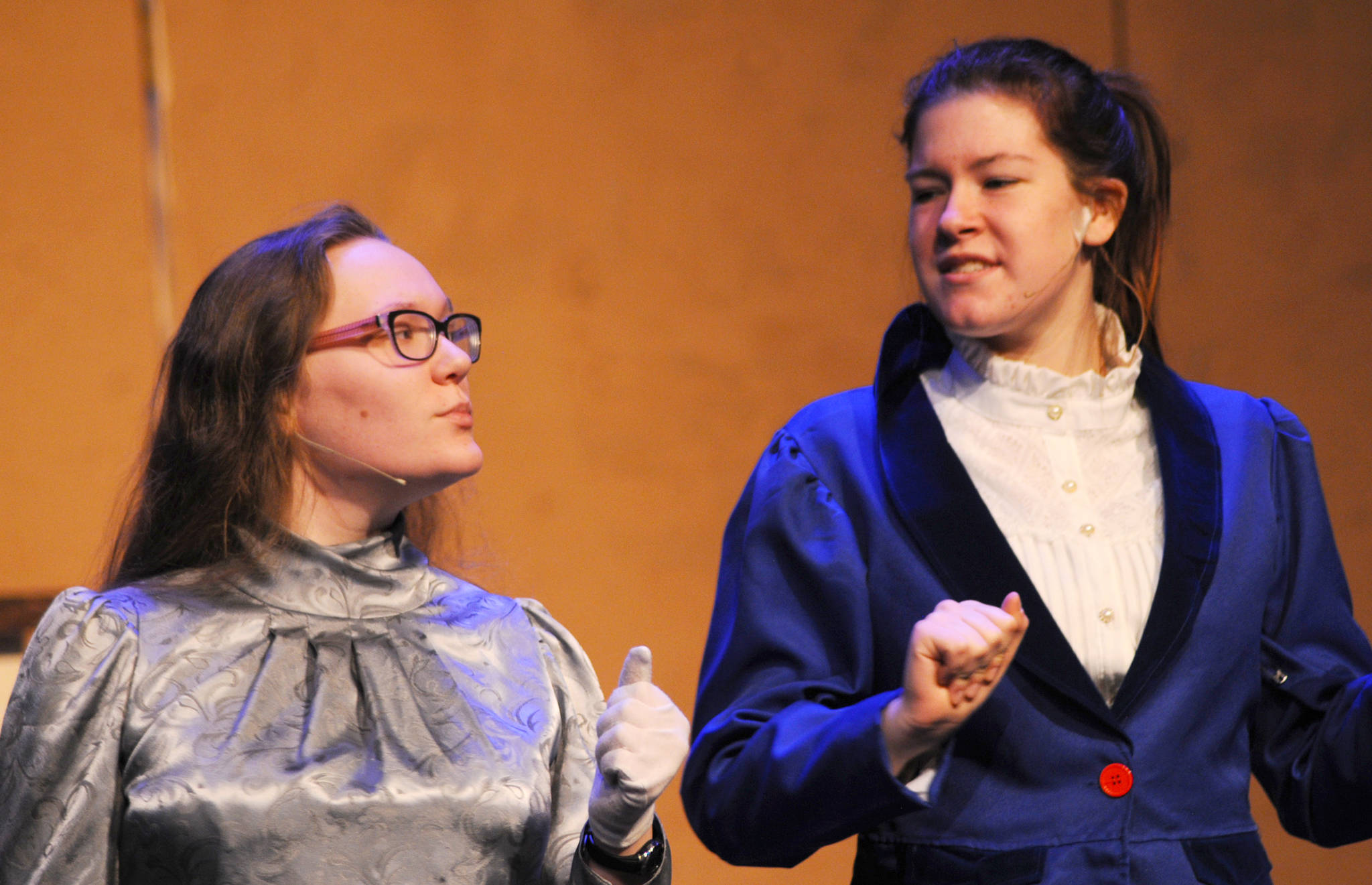 Governess Ms. Andrews (played by Sarah Nash) speaks to Mary Poppins (played by Emilee Tiner) during a dress rehearsal for Nikiski Middle-High School’s production of “Mary Poppins” on Monday, April 23, 2018 in Nikiski, Alaska. The play premiers Friday at 7 p.m. at the high school. Tickets are $15. (Photo by Elizabeth Earl/Peninsula Clarion)