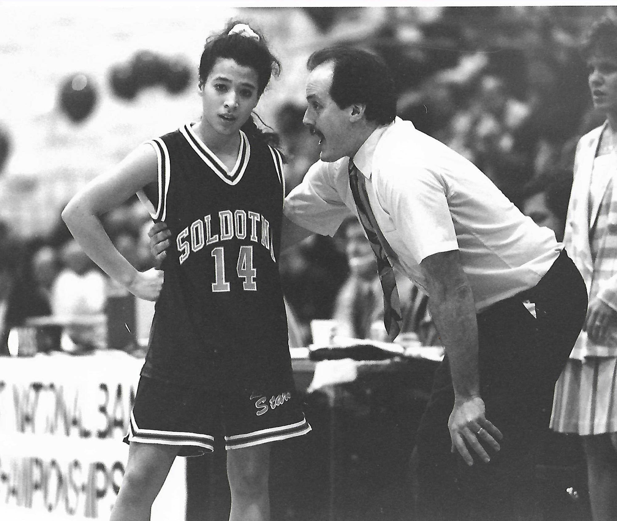 Former Soldotna High School girls basketball coach Dan Gensel gives words of encouragement to Melissa Smith in the 1993 Class 3A state championship game. (Photo provided by Dan Gensel)