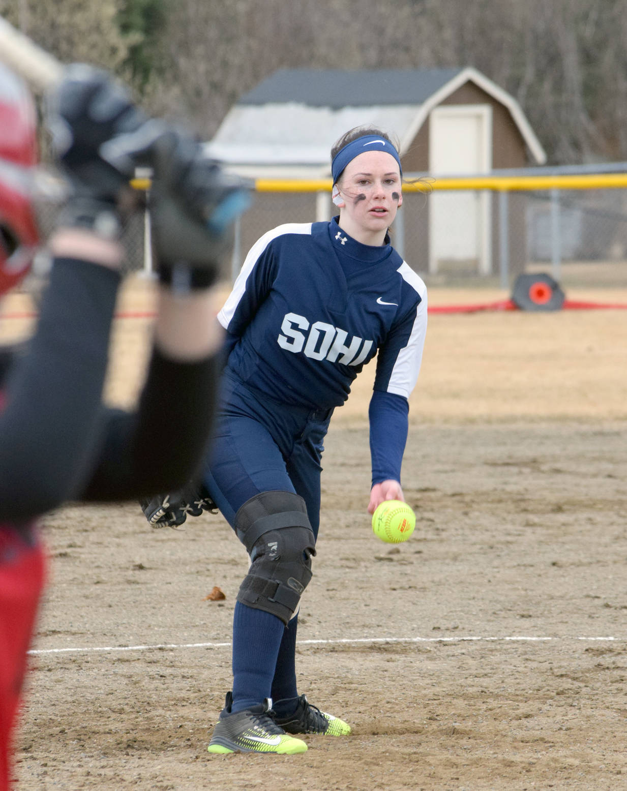 Soldotna’s Taralynn Frates delivers a pitch in the bottom of the first inning Thursday, May 3, 2018, at Steve Shearer Memorial Ball Park in Kenai. (Photo by Jeff Helminiak/Peninsula Clarion)