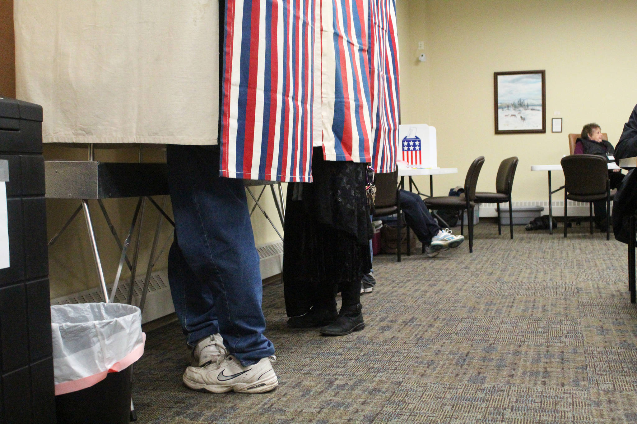 Residents vote in booths set up in Homer City Hall on Tuesday, Oct. 3, 2017 in Homer, Alaska. (Photo by Megan Pacer/Homer News)