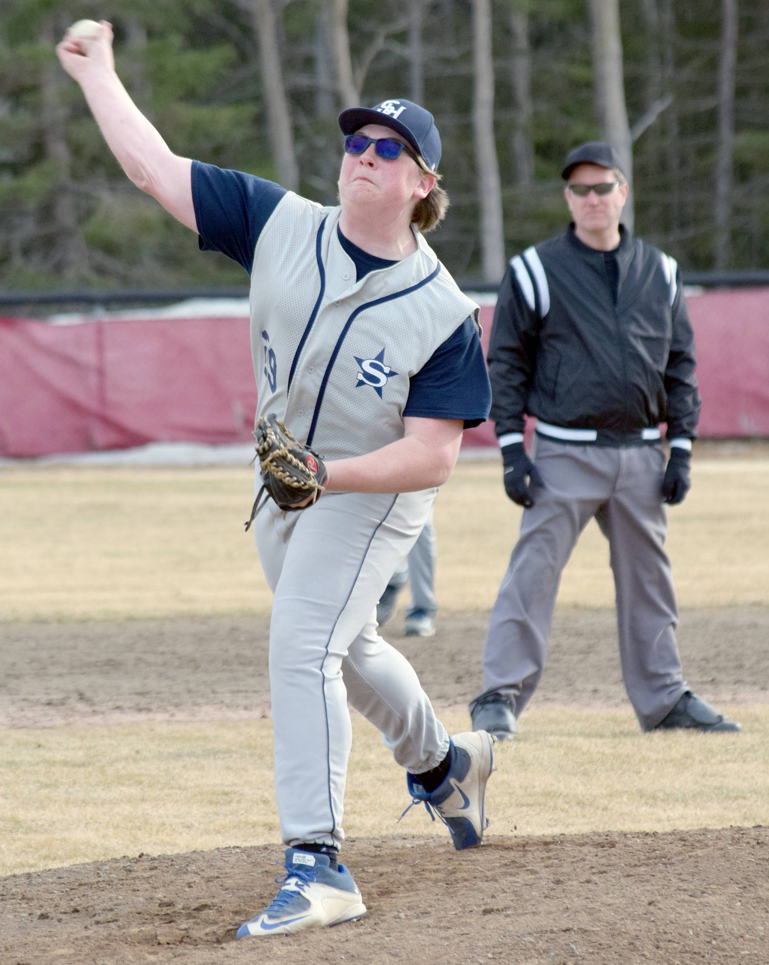 Jake Marcuson delivers to Kenai Central on Monday, May 7, 2018, at the Kenai Little League fields. (Photo by Jeff Helminiak/Peninsula Clarion)