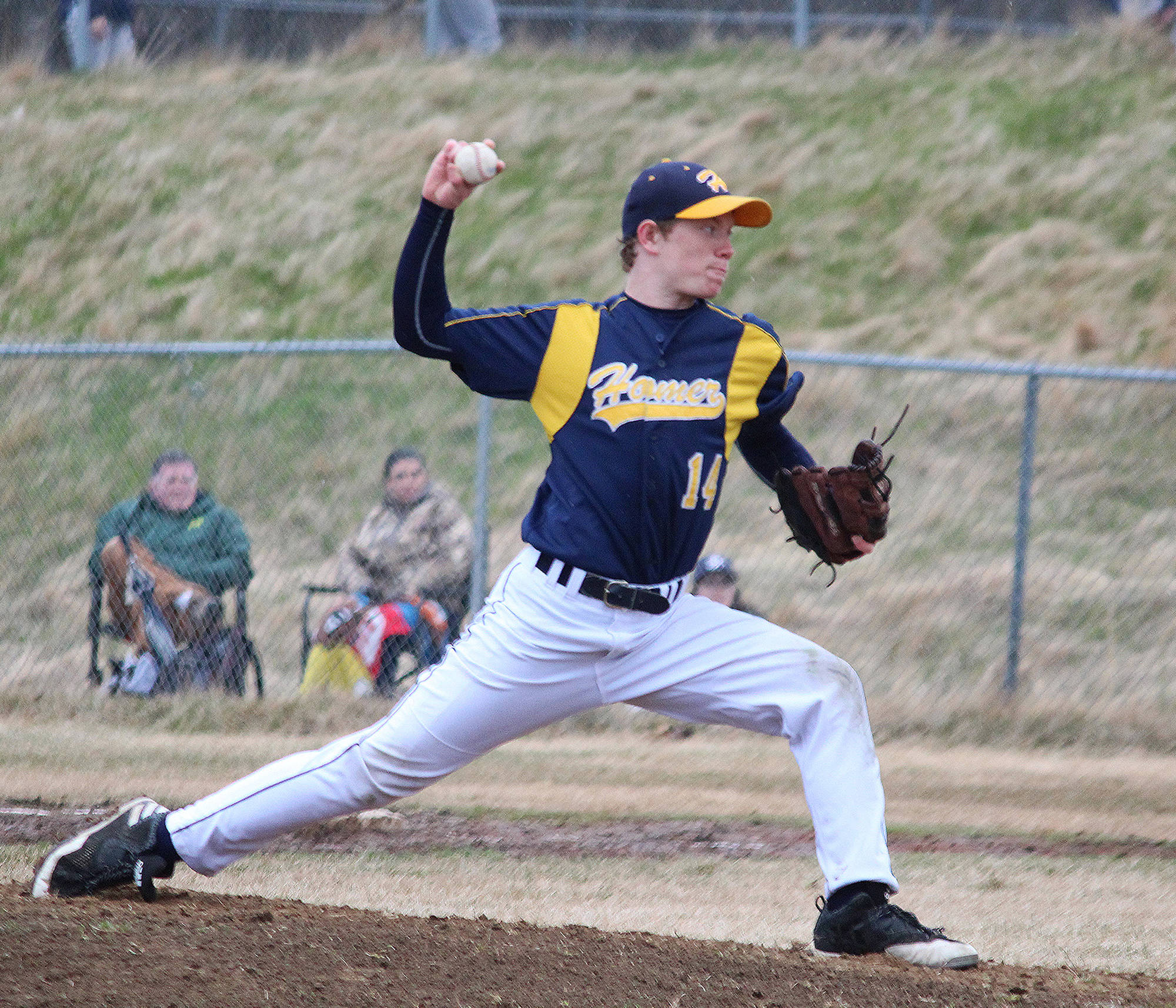 Homer’s Mose Hayes pitches during a Southcentral Conference game against Soldotna on Thursday, May 10, 2018 at Homer High School in Homer, Alaska. (Photo by Megan Pacer/Homer News)