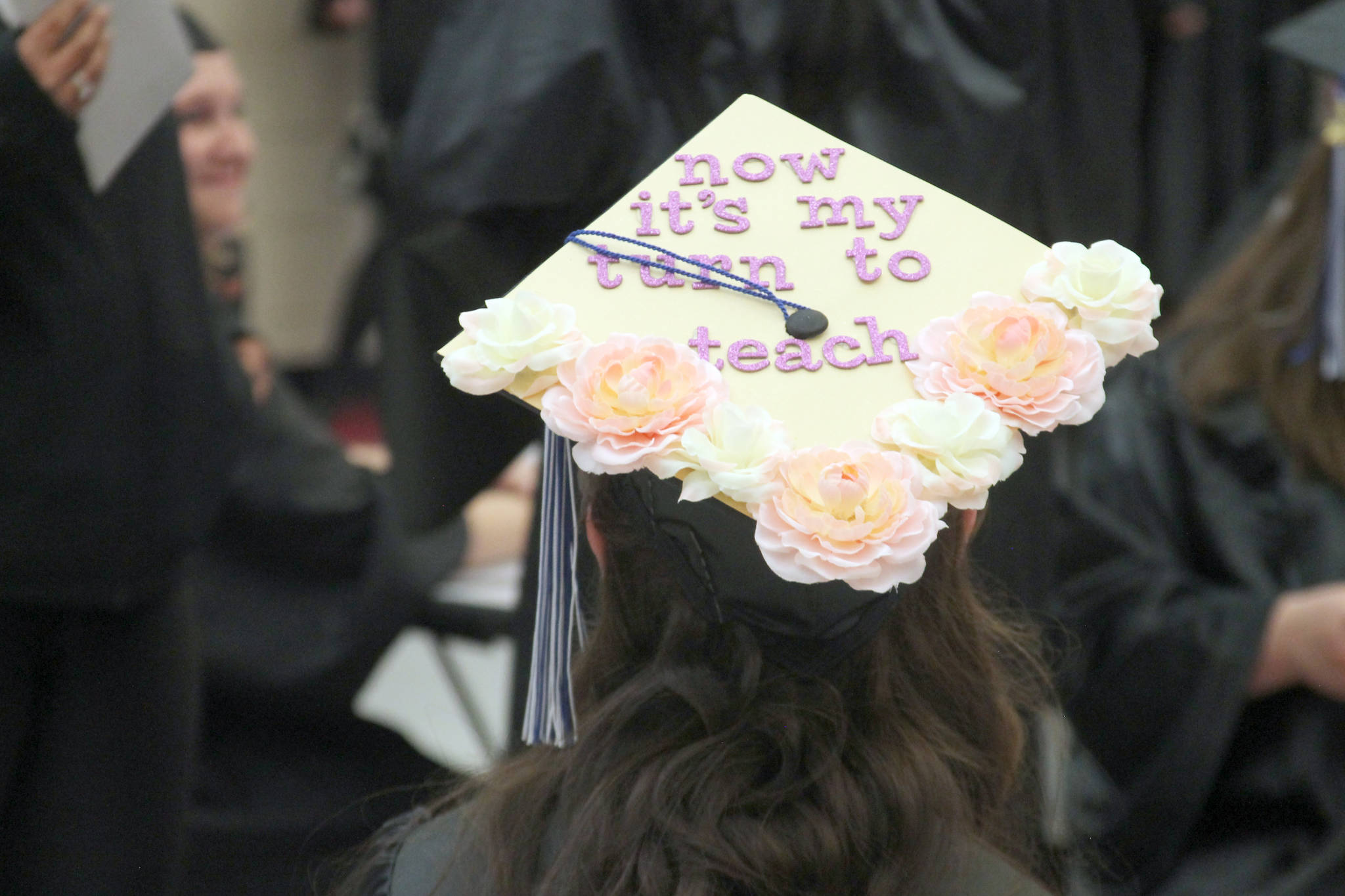 Beginning a new chapter: Kenai River Campus graduates take home diplomas