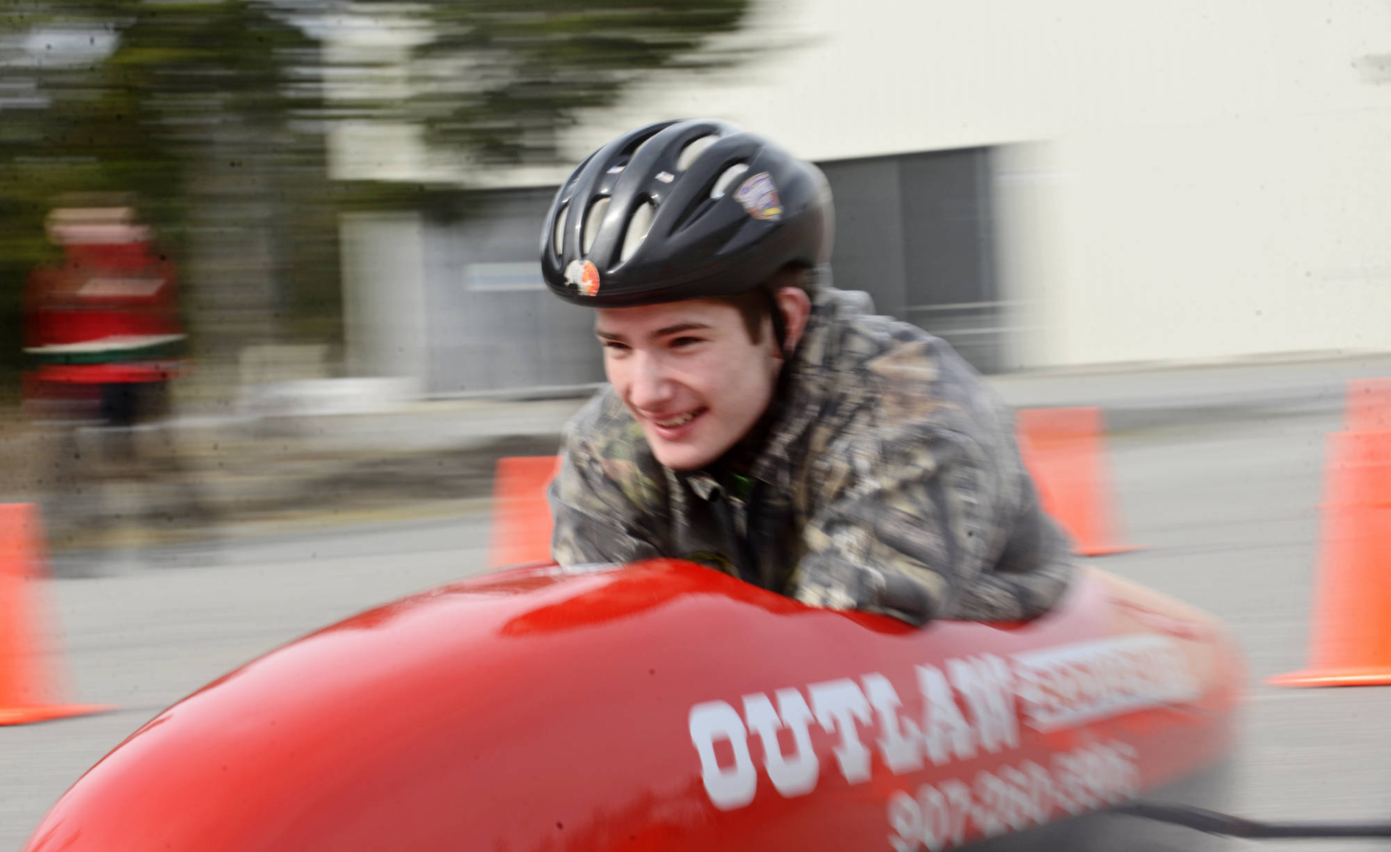 Alexander Van De Grift races in the Kenai Rotary Club’s 12th anual Soapbox Derby on Saturday, May 12, 2018 at the Challenger Learning Center in Kenai, Alaska. Van De Grift won a craftsmanship trophy for his car, which was sponsored by Outlaw Body and Paint. (Ben Boettger/Peninsula Clarion).