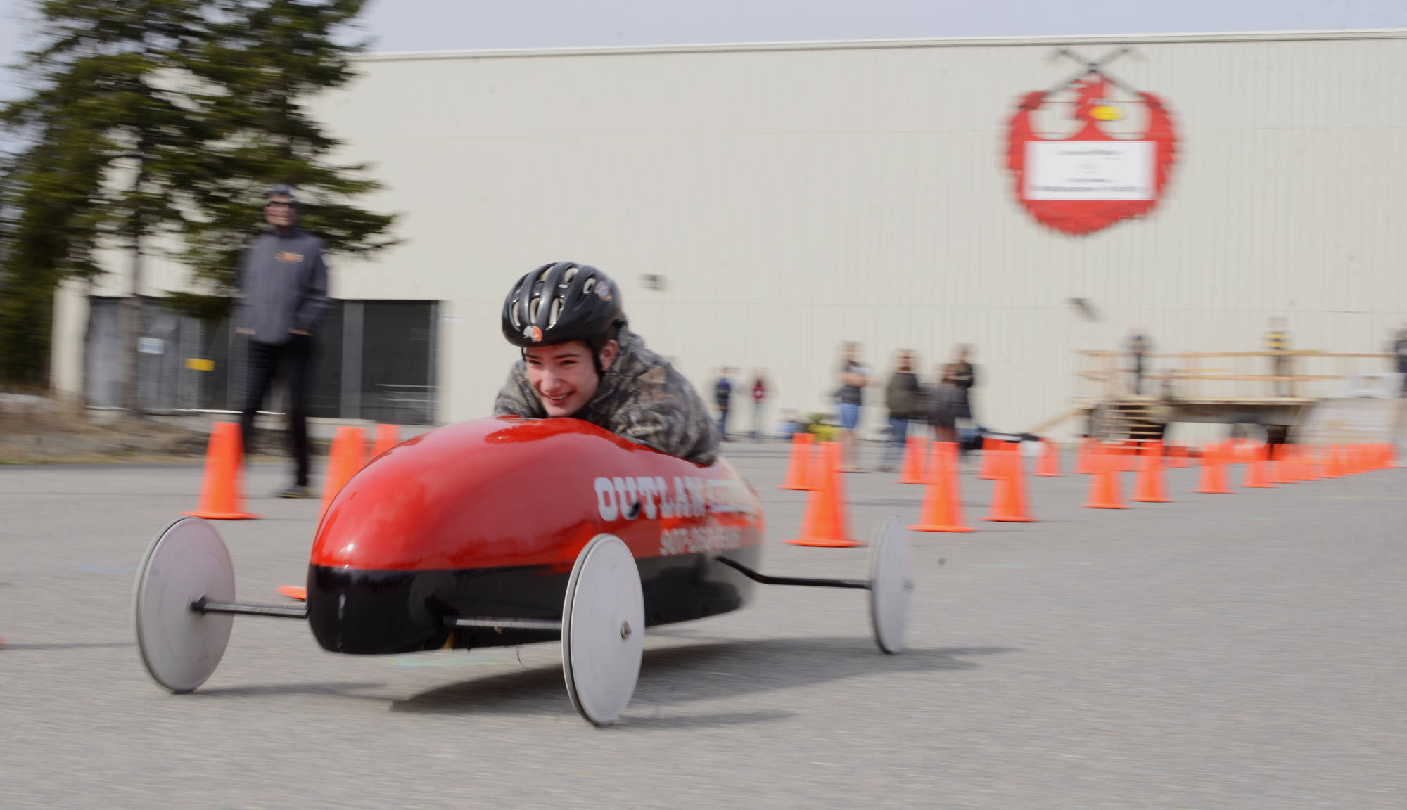 Alexander Van De Grift races in the Kenai Rotary Club’s 12th anual Soapbox Derby on Saturday, May 12, 2018 at the Challenger Learning Center in Kenai, Alaska. Van De Grift won a craftsmanship trophy for his car, which was sponsored by Outlaw Body and Paint. (Ben Boettger/Peninsula Clarion).