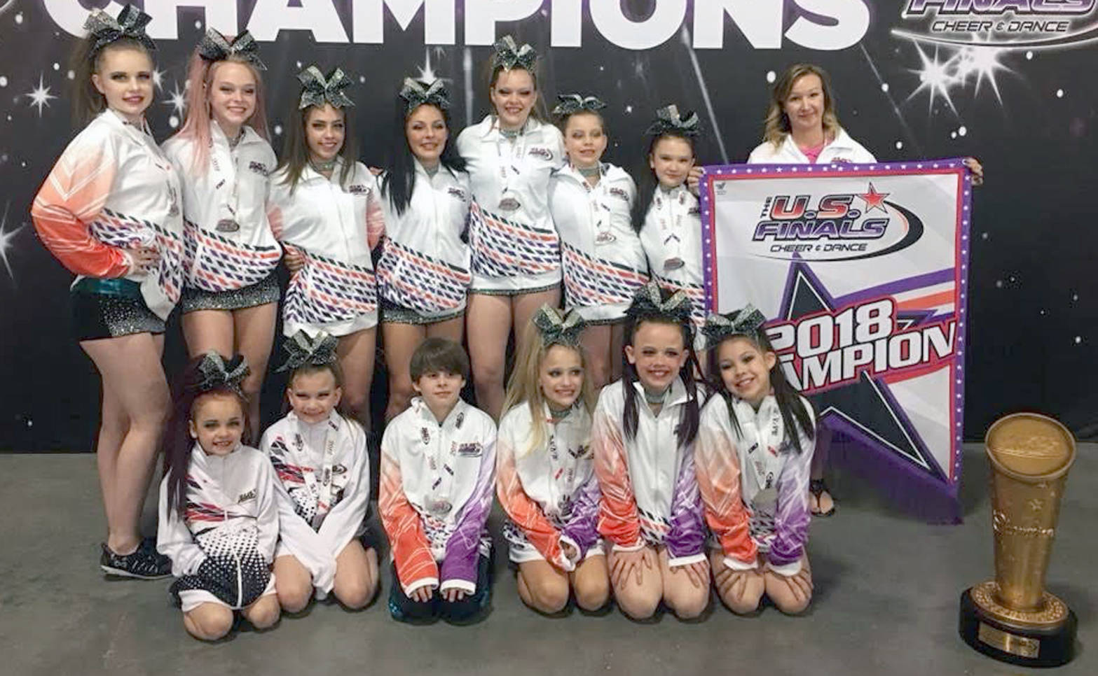 The All-Star Cheerleading Team from River City Cheer and Gymnastics poses after winning the U.S. Finals National Championships in Las Vegas on Sunday, May 13, 2018. From top left to right, Sierra Stoaks, Cali Holmes, Morgan Chase, Avery Hart, Cheyenne Friedersdorff, Destiney Friedersdorff, Sylvia McGraw and coach Cari Winger. From bottom left to right, Ayden Russell, Cara Graves, Jackson Anding, McKenzie Harden, Liberty Lasky, Delilah Roberts.