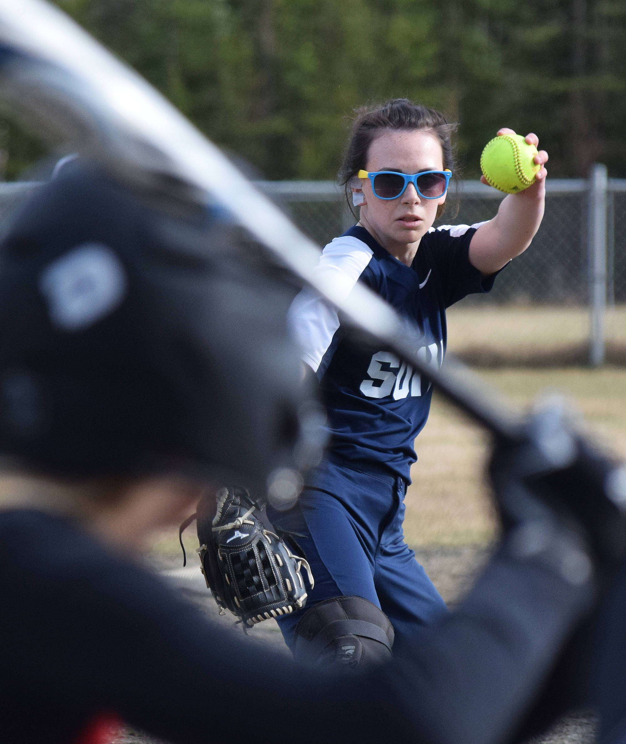 Soldotna senior Taralynn Frates offers up a pitch to a Kenai Central batter Friday in a Northern Lights Conference contest at the Soldotna softball fields. (Photo by Joey Klecka/Peninsula Clarion)