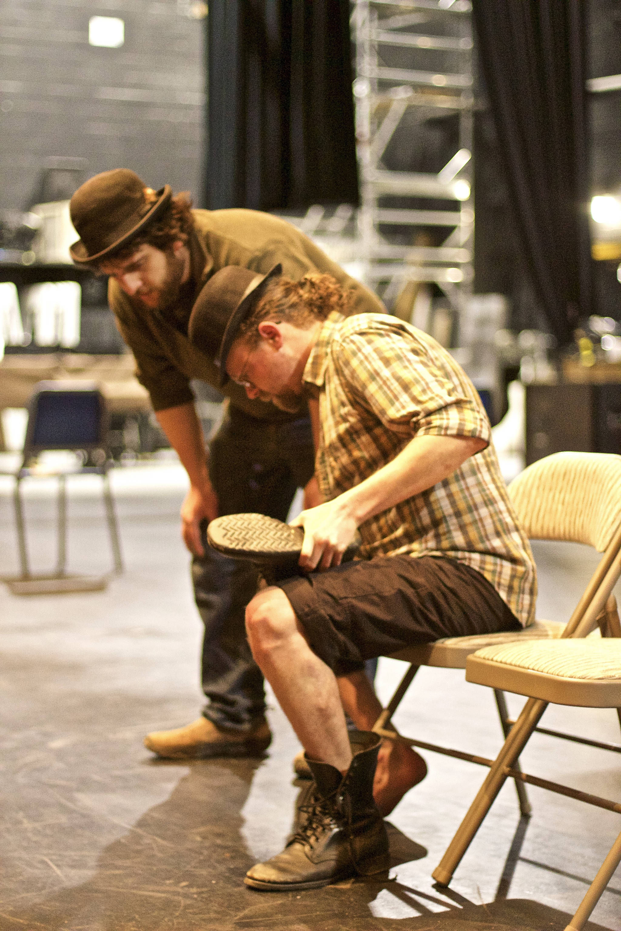 Peter Sheppard, left, and Matt Lees, right practice a scene from Samuel Beckett’s “Waiting for Godot.” Sheppard directs the play, opening at 7 p.m. Friday, May 25, for the start of Pier One Theatre’s 2018 season. (Photo by Richard Rose)