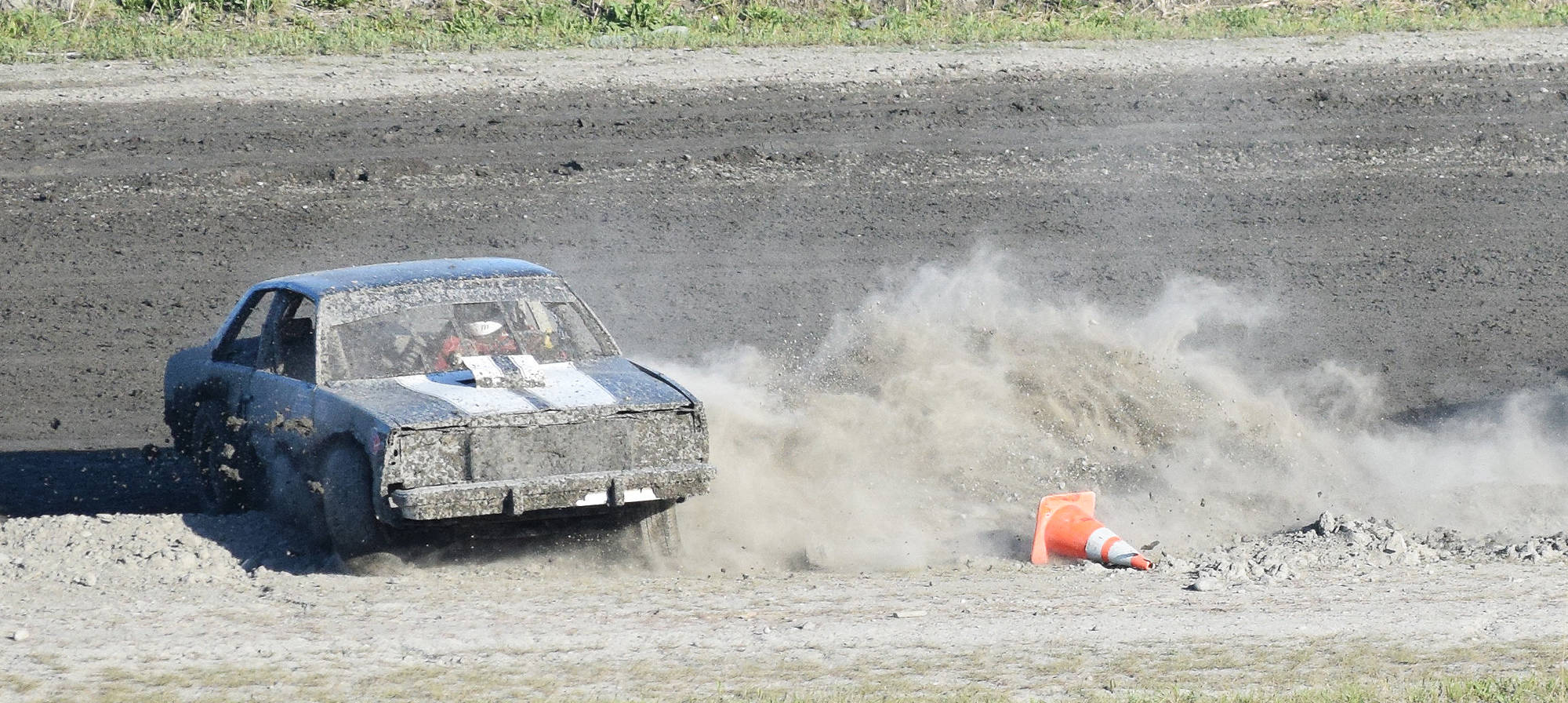 Jackson Kahn spins out during an A-Stock heat race Saturday night at Twin City Raceway in Kenai. (Photo by Joey Klecka/Peninsula Clarion)