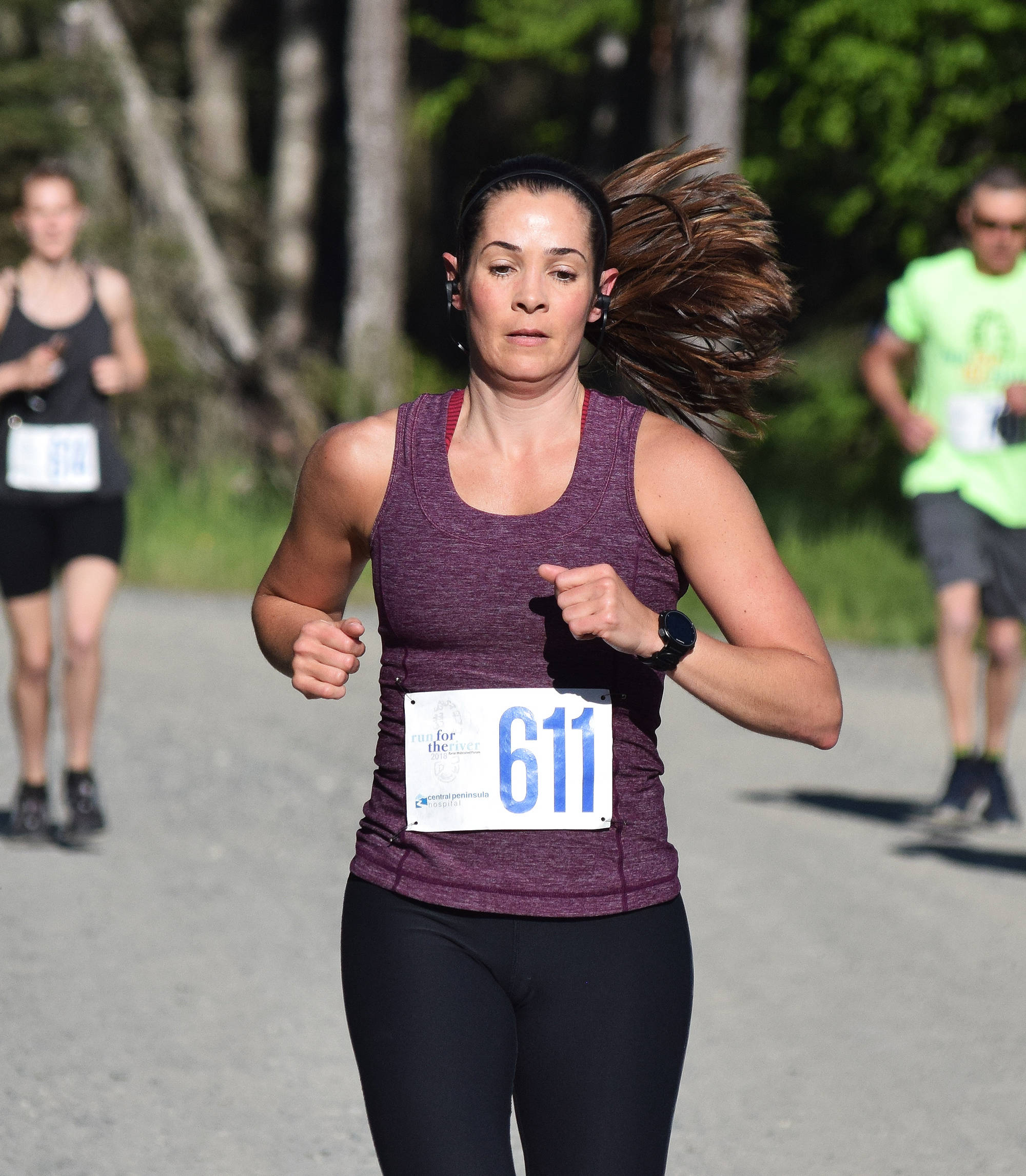 Jodi Hanson sets a pace in the women’s 10-miler Saturday morning at the Run for the River 5K/10-mile races near Soldotna Creek Park. (Photo by Joey Klecka/Peninsula Clarion)
