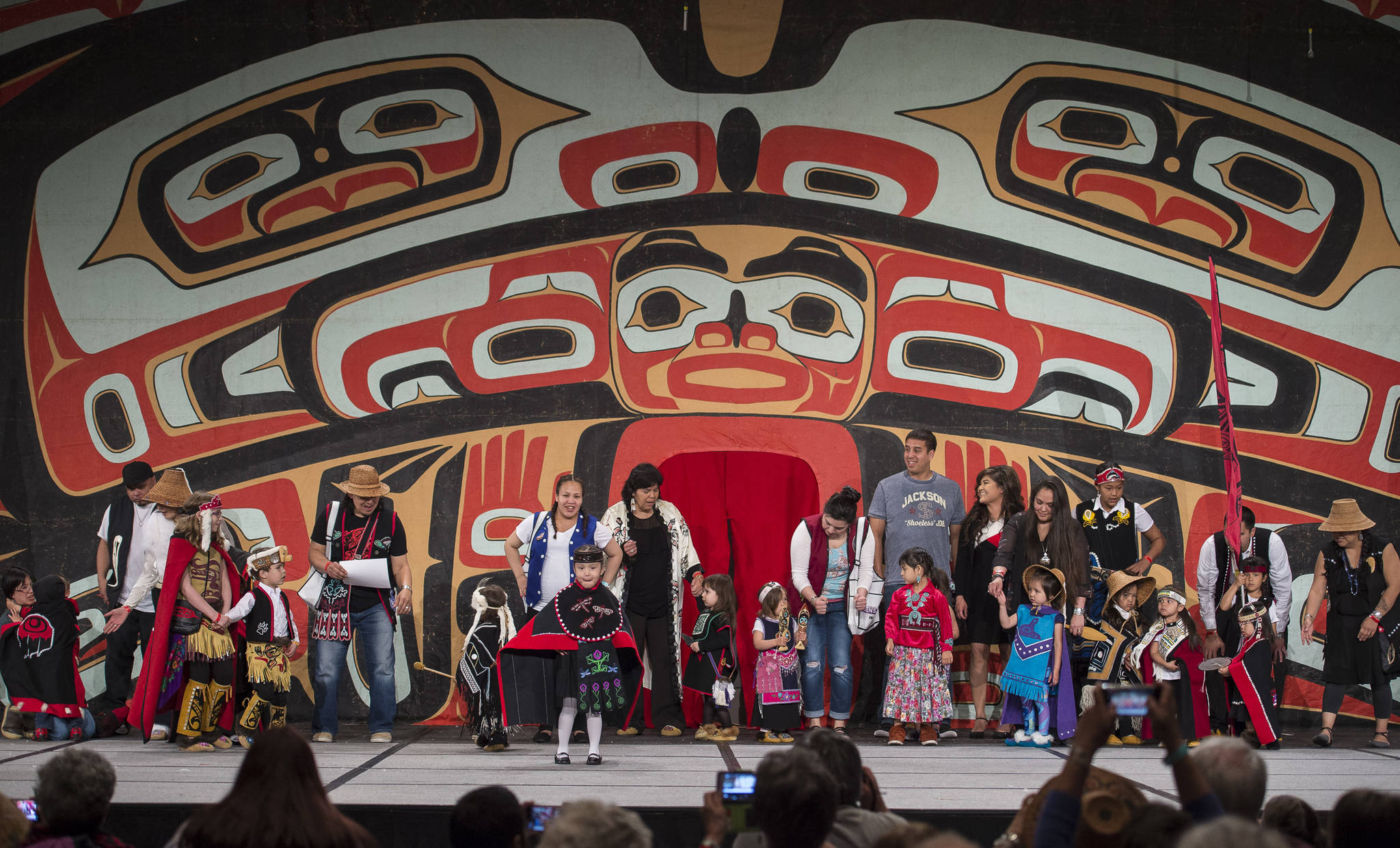 Children and their parents participate in the Toddler Fashion Show on the main stage at Centennial Hall for Celebration 2018 on Friday, June 8, 2018. (Michael Penn | Juneau Empire)
