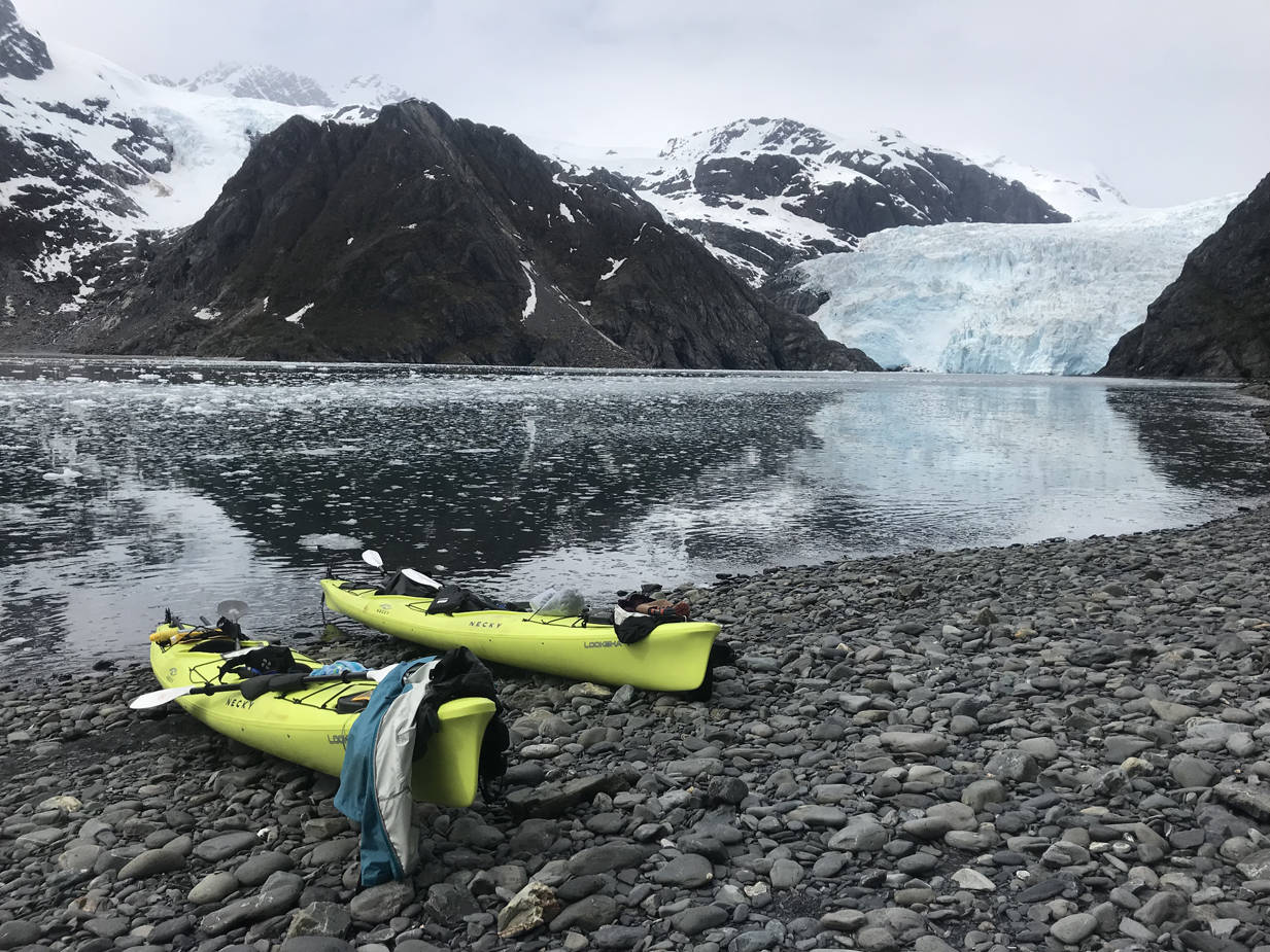 A pair of sea kayaks prepare to play the waters of Kenai Fjords National Park earlier this summer. (Photo by Kat Sorensen)