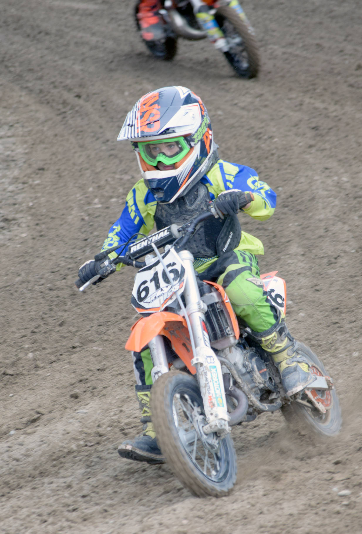Kash Williams, of Soldotna, negotiates a turn in the 50cc race at the Alaska State Motocross Championships at Twin City Raceway on Sunday, June 17, 2018. (Photo by Jeff Helminiak/Peninsula Clarion)