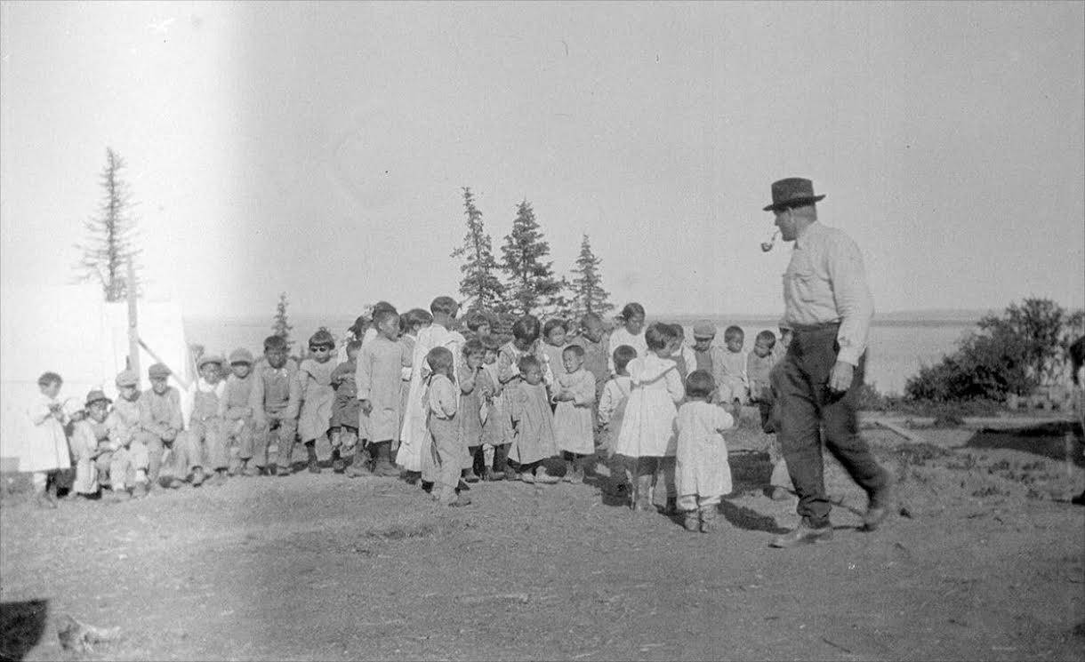 This historical photograph shows doctor Linus Hiram French with orphans of the Spanish flu epidemic in 1919. (Photo courtesy of Tim Troll)