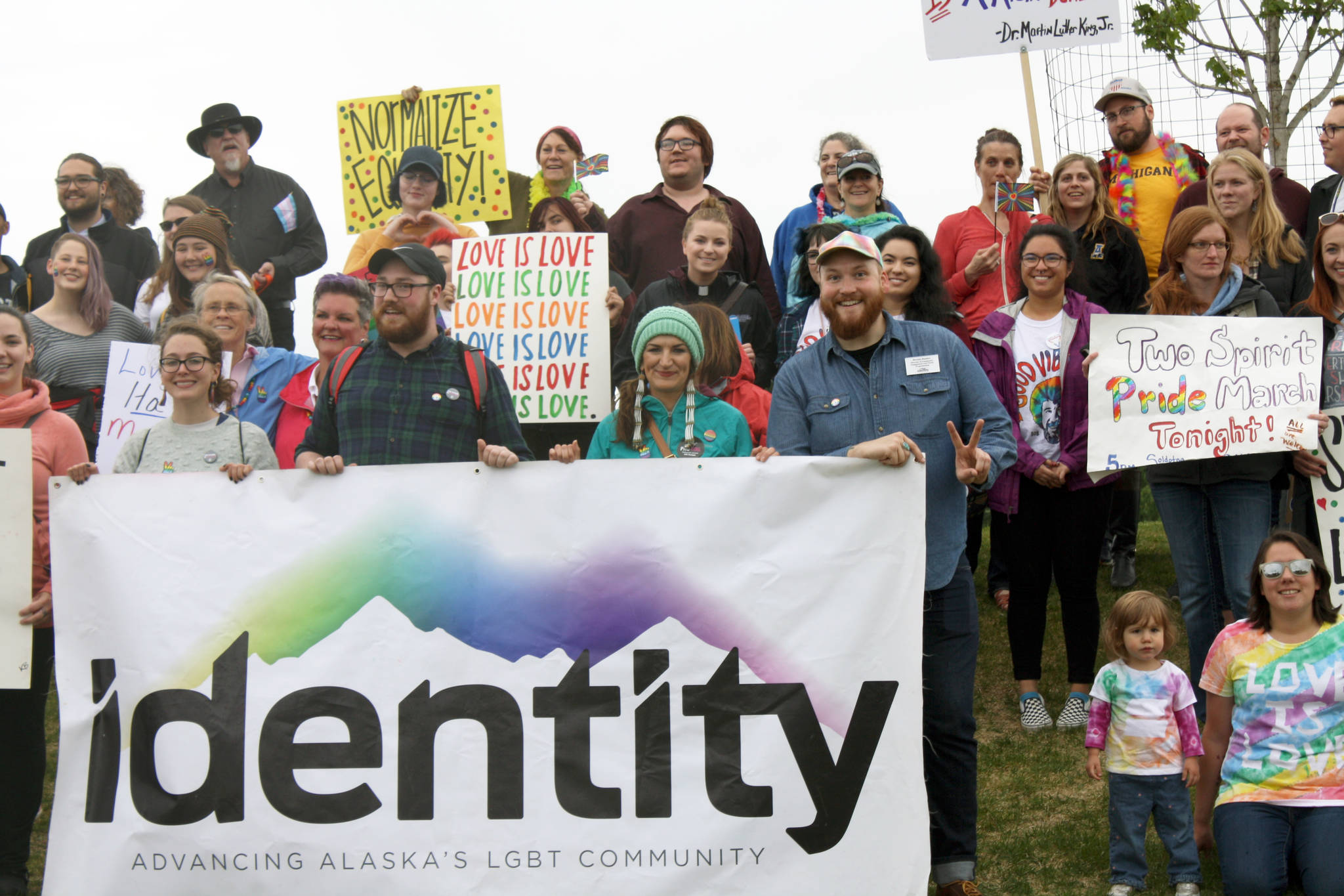 Participants in the Two Spirit Pride March gather at Soldotna Creek Park Wednesday. About 60 people turned out to celebrate June LGBTQ Pride Month. (Photo by Erin Thompson/Peninsula Clarion)
