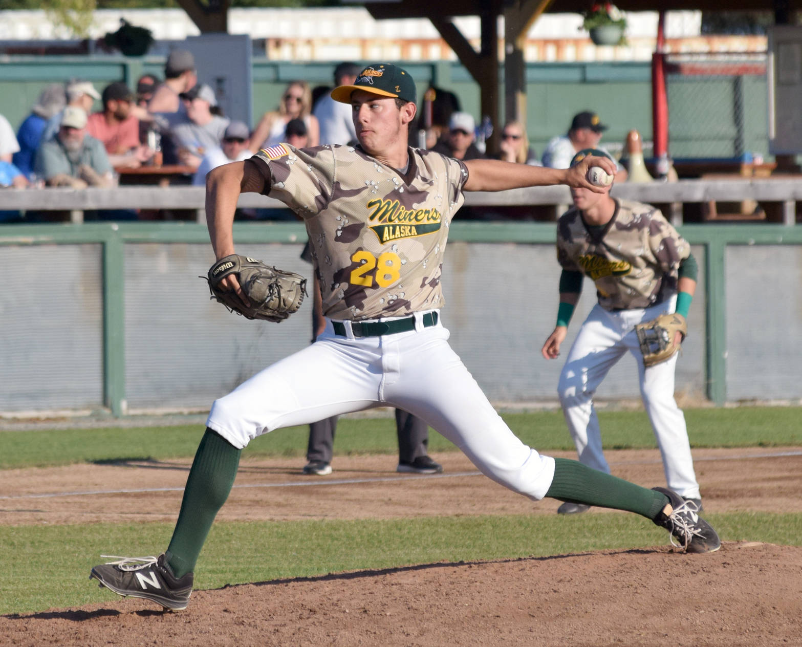 Miners starter Ian Churchill delivers to the Peninsula Oilers en route to picking up the victory Friday, July 6, 2018, at Coral Seymour Memorial Park in Kenai. (Photo by Jeff Helminiak/Peninsula Clarion)