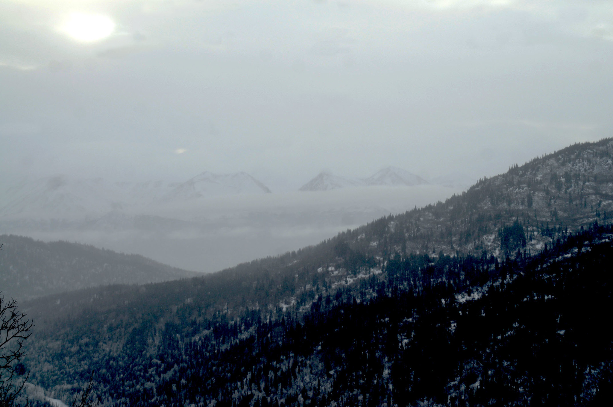 Snow begins to fly in the mountains around Skilak Lake near the Skyline Trail on the Kenai National Wildlife Refuge on Friday, Jan. 13, 2017 near Cooper Landing, Alaska. The Kenai Peninsula saw a warm day Friday, with temperatures up to 20 degrees on parts of the peninsula, but will plunge into a cold snap along with the rest of the state in the coming week. Sunday’s high is 13 degrees with a chance of snow, and by Wednesday, the high will be approximately 4 degrees, according to the National Weather Service. In the Interior, the National Weather Service predicts a high of minus 18 degrees for Fairbanks on Sunday. (Elizabeth Earl/Peninsula Clarion)