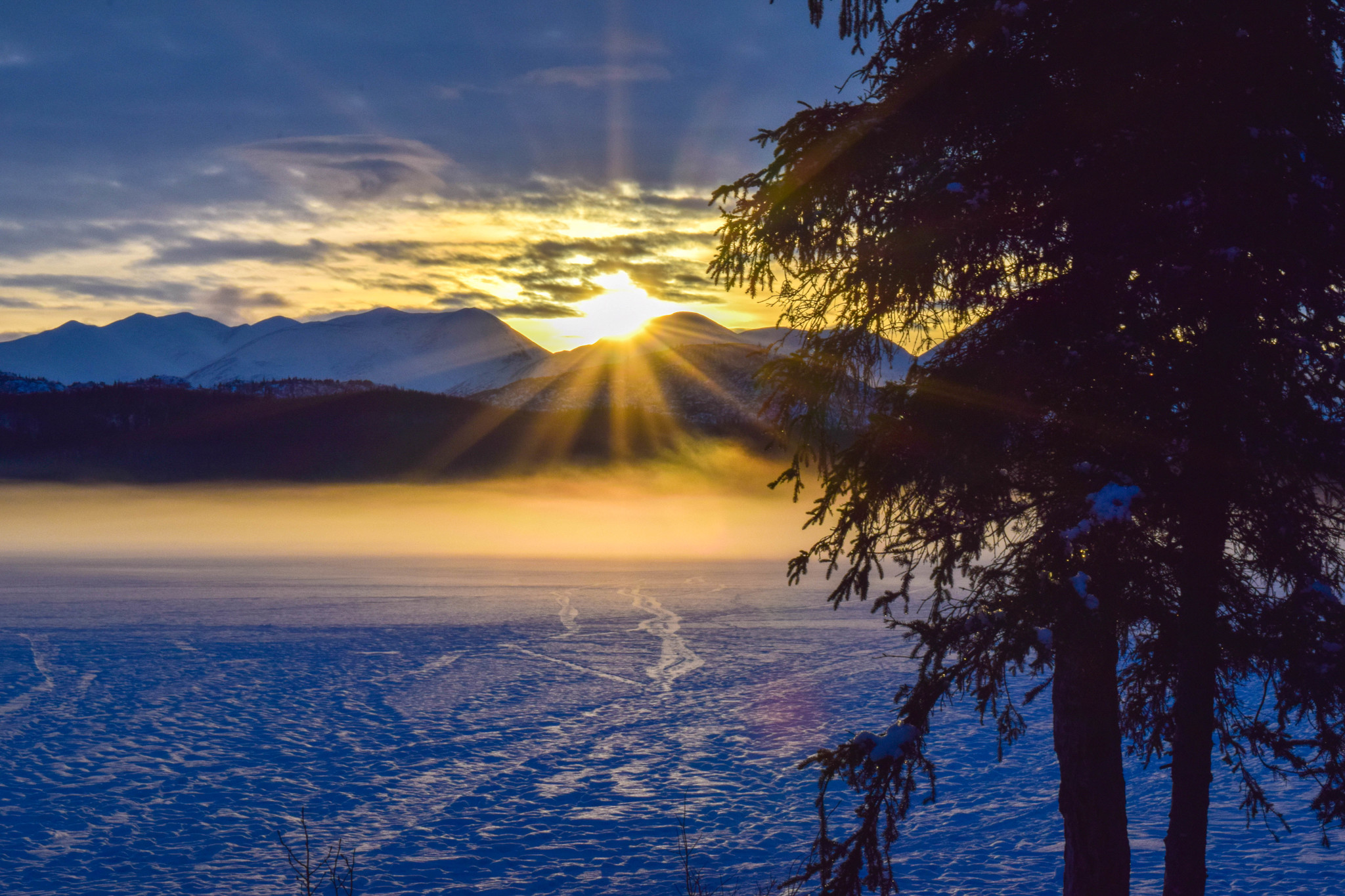 The sun rises over Engineer Lake on the Kenai National Wildlife Refuge. Reserving one of the refuge’s public use cabins can be a fun, Alaskan way to celebrate the holidays. (Photos courtesy Rebecca Uta)