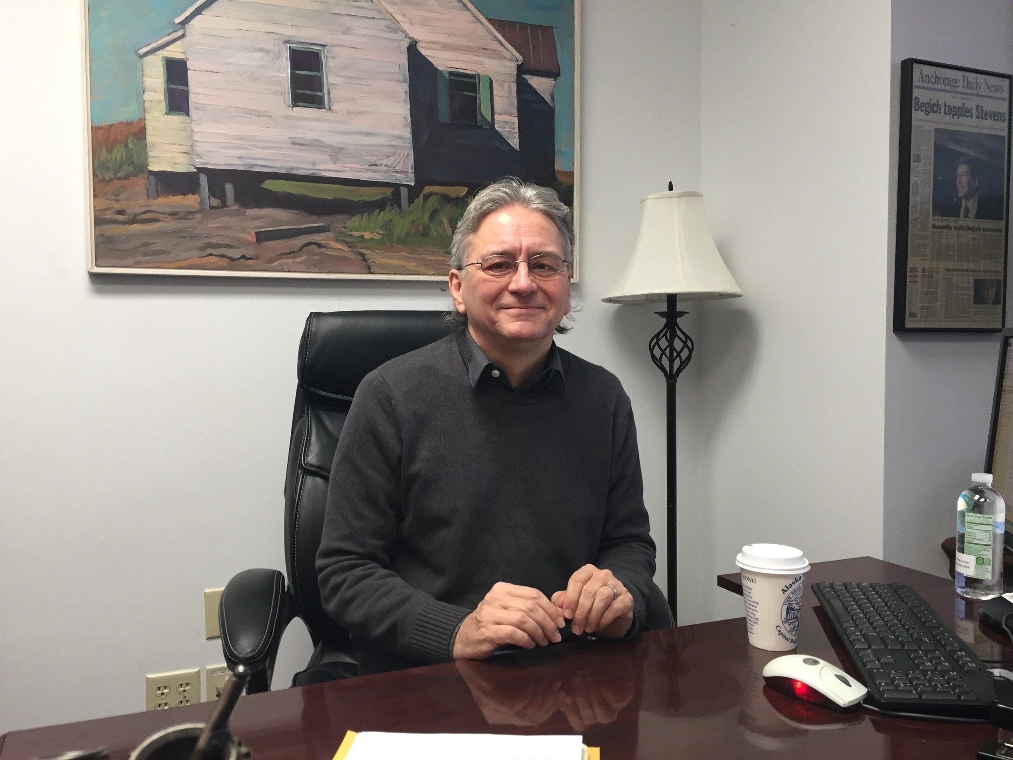 Alaska state Sen. Tom Begich poses in his Capitol office on Monday, Jan. 23, 2017, in Juneau, Alaska. Begich, a Democrat, has signed on as a co-sponsor of legislation that would restore the portion of Alaskans’ oil wealth checks cut by Gov. Bill Walker last year. (AP Photo/Becky Bohrer)