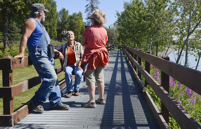 A group enjoys the sunny weather at Cunningham Park in Kenai.