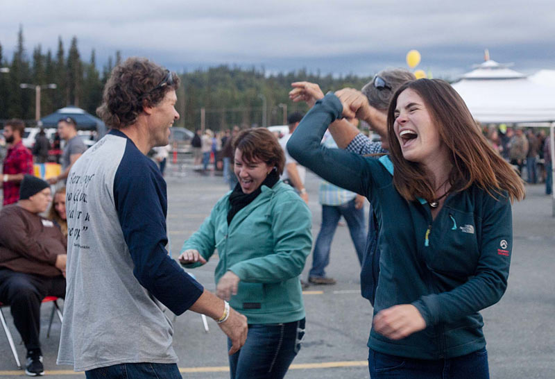 Revelers dance during the annual Kenai Peninsula Beer Festival in Soldotna.