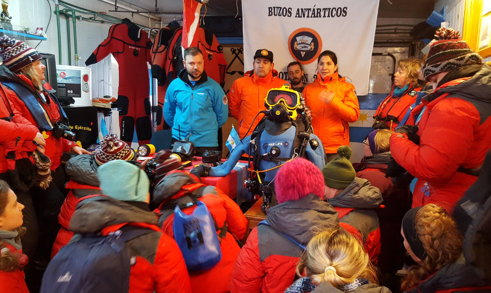 Homeward Bound participants learning about the dive program at Carlini Base, one of Argentina’s 13 research stations in Antarctica. (Photo provided by Sue Mauger)
