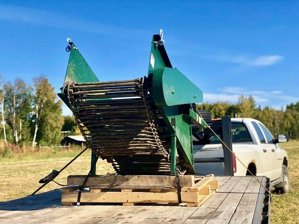 Kenai Soil and Water Conservation District’s newest farm equipment rental is a potato digger that will cut down on labor-intensive potato harvesting for area farmers. The equipment sits ready for use at Ridgeway Farms on Thursday, Sept. 13, 2018, near Soldotna, Alaska. (Photo by Victoria Petersen/Peninsula Clarion)