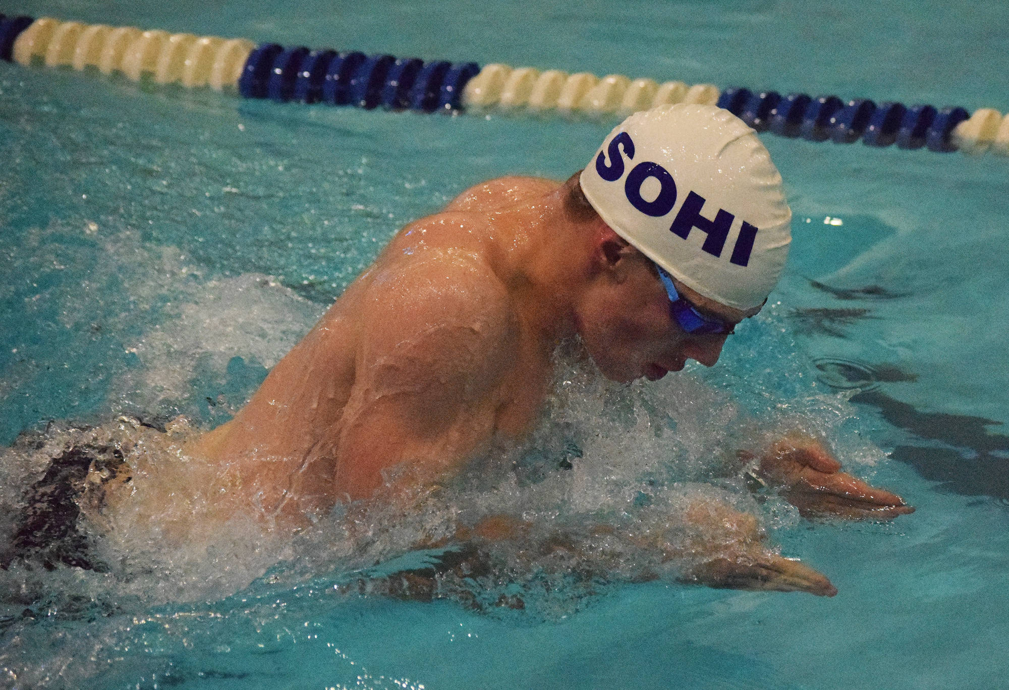 Soldotna swimmer Ethan Evans races through the boys 50-yard breaststroke Friday at the SoHi Pentathlon in the Soldotna High School pool. (Photo by Joey Klecka/Peninsula Clarion)