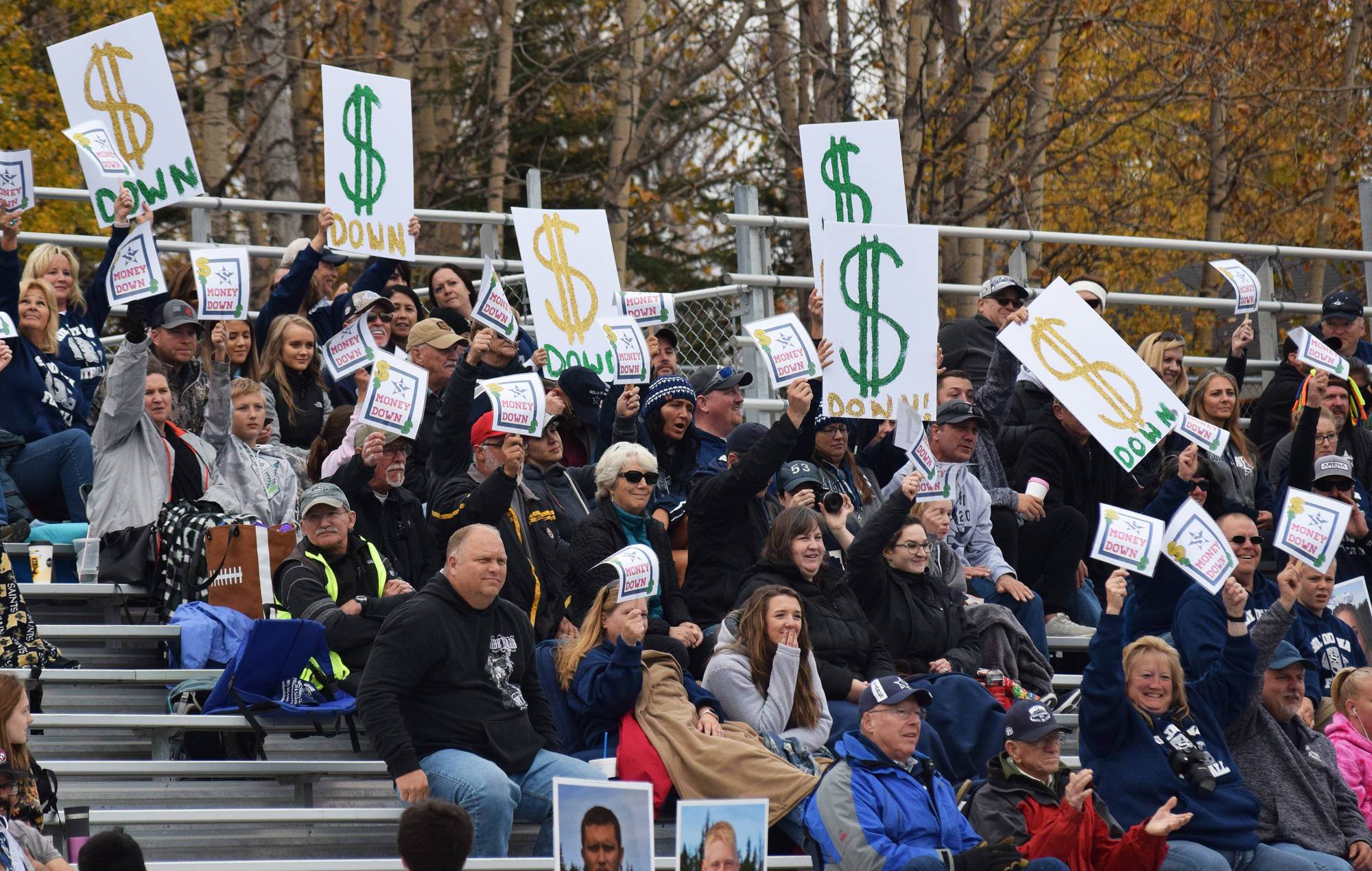 Soldotna football fans cheer on their team in a Division II state semifinal game Saturday afternoon at Palmer’s Machetanz Field. (Photo by Joey Klecka/Peninsula Clarion)