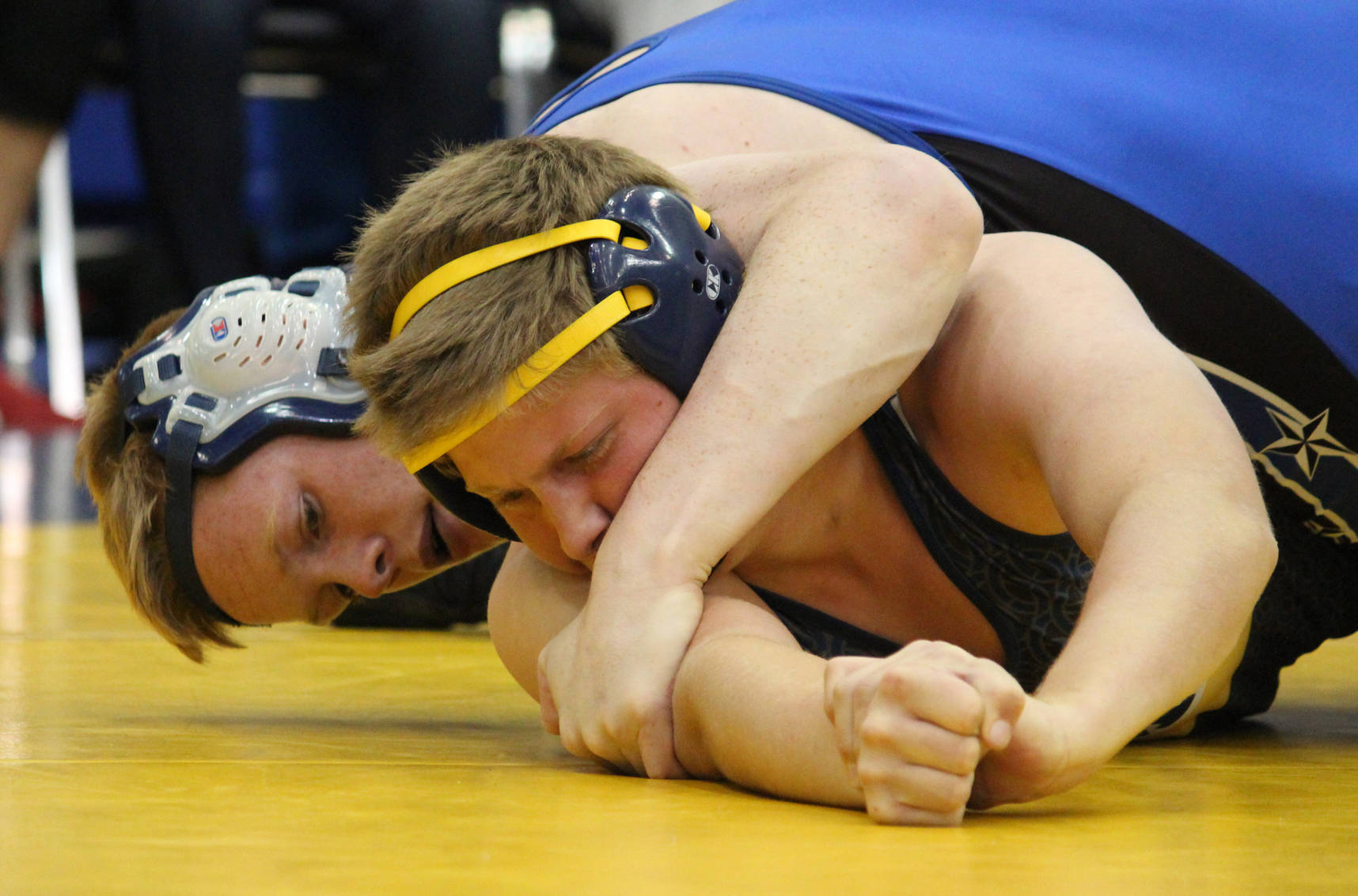 Soldotna’s Sean Babitt controls Homer’s Ryan Hicks during their 171-pound weight class bout Friday, Oct. 19, 2018 at Homer High School in Homer, Alaska. Babitt went on to win the encounter. (Photo by Megan Pacer/Homer News)