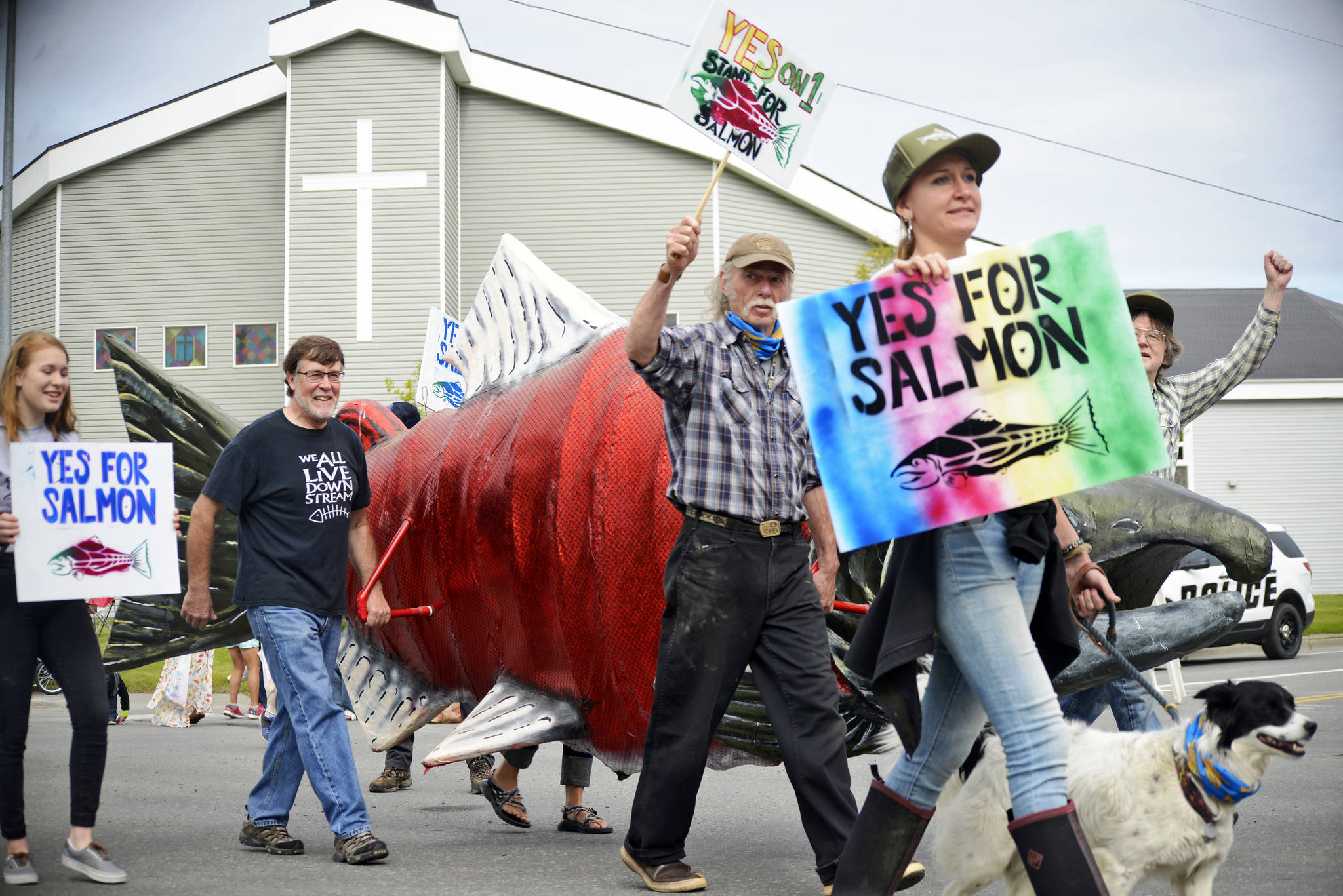 Supporters of the proposed Ballot Measure 1 — commonly known as the Stand for Salmon initiative — march in the Soldotna Progress Days Parade on Saturday, July 28, 2018 in Soldotna Alaska. Some of the initiative, which would tighten the Alaska Department of Fish and Game’s permitting for construction in potential salmon habitat, will be on the Nov. 6 general election ballot after the Alaska Supreme Court issued a decision Wednesday ruling that parts of the original initiative would make unconstitutional resources appropriations and should be stricken out. (Elizabeth Earl/Peninsula Clarion).
