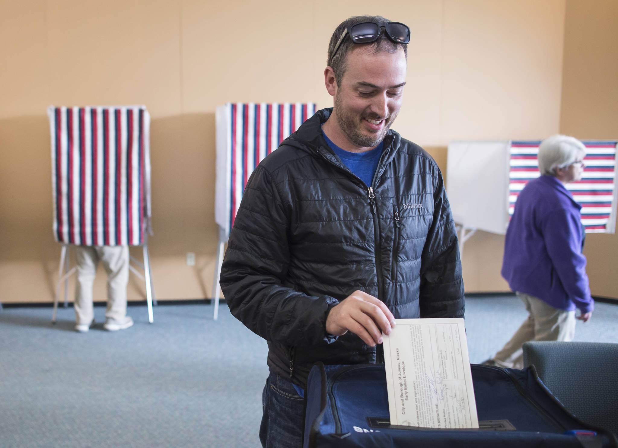 Trenton English takes advantage of early voting in the municipal election at the Mendenhall Mall Annex on Monday, Sept. 17, 2018. Early voting is available there from 11 a.m. to 6 p.m. Monday-Friday. Voters can also vote at City Hall 8 a.m. to 4:30 p.m. Monday-Friday. (Michael Penn | Juneau Empire)