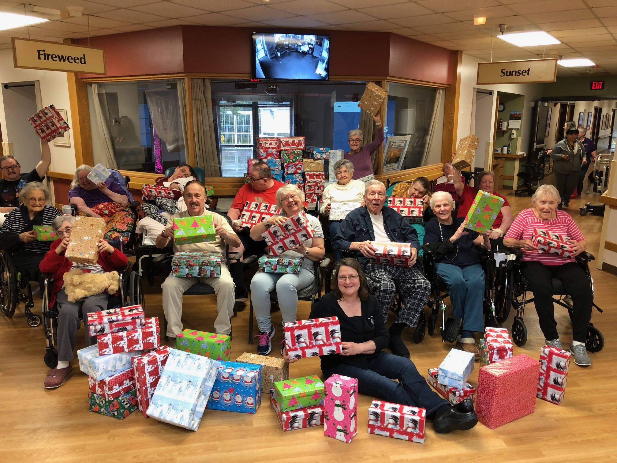 Heritage Place residents wrap holiday boxes with Samaritan’s Purse