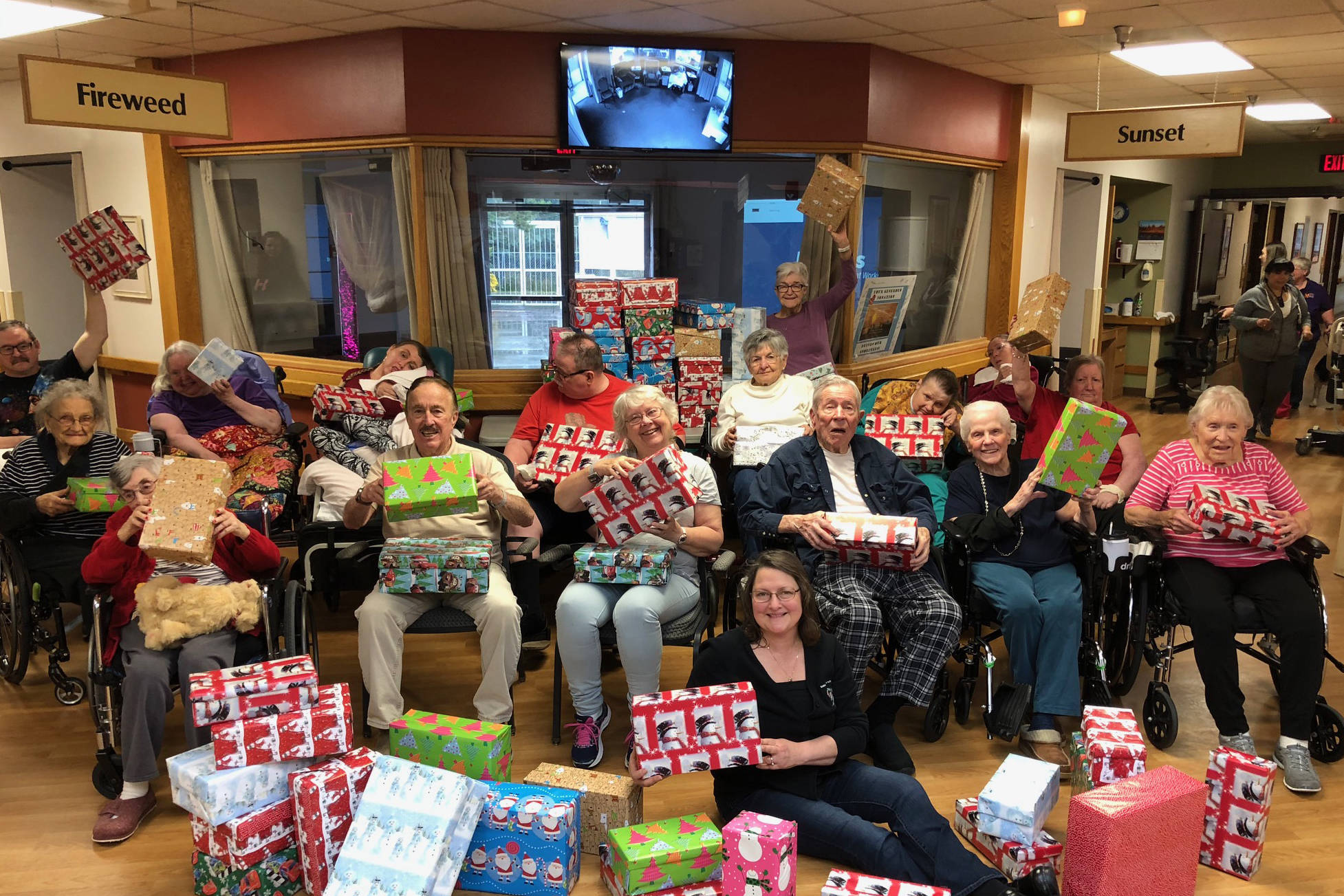 Heritage Place residents wrap holiday boxes with Samaritan’s Purse