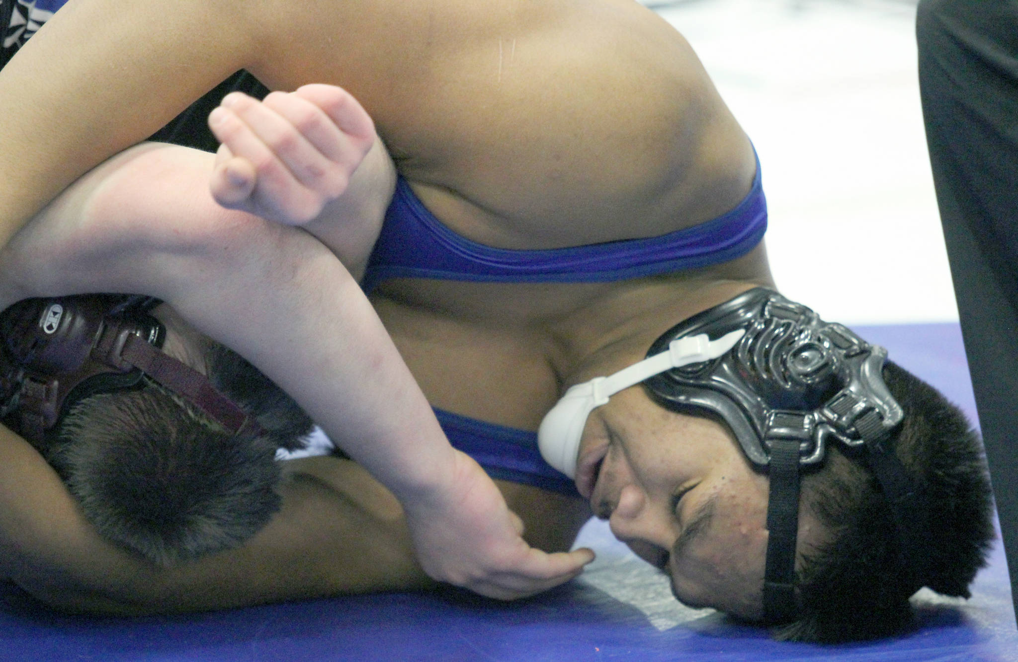 Soldotna’s Aaron Faletoi pins Unalaska’s Seth Henning during the 215-pound final of the Lancer Smith Memorial on Saturday in Wasilla. (Photo by Jeremiah Bartz/Frontiersman)