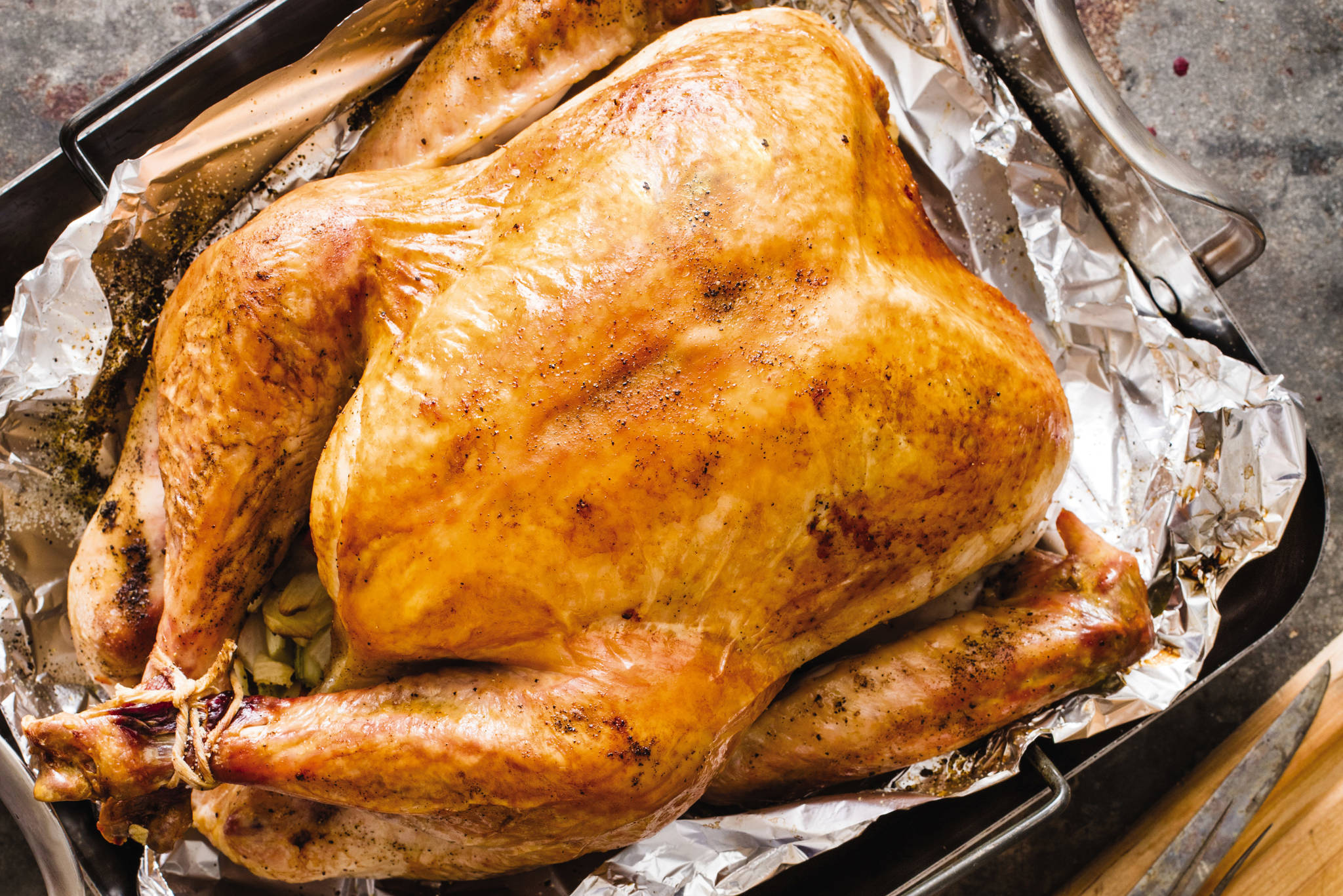 This undated photo provided by America’s Test Kitchen in October 2018 shows a roast turkey in Brookline, Mass. This recipe appears in the cookbook “ATB Holiday Entertaining.” (Daniel J. van Ackere/America’s Test Kitchen via AP)