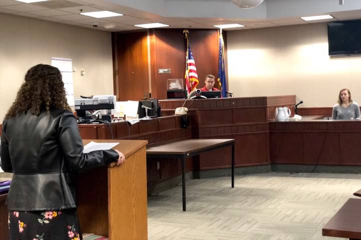 Hannah Young, who played a prosecutor, questions a witness during Nikiski High’s Thursday mock murder trial at the Kenai Courthouse on Thursday. (Photo by Victoria Petersen/Peninsula Clarion)