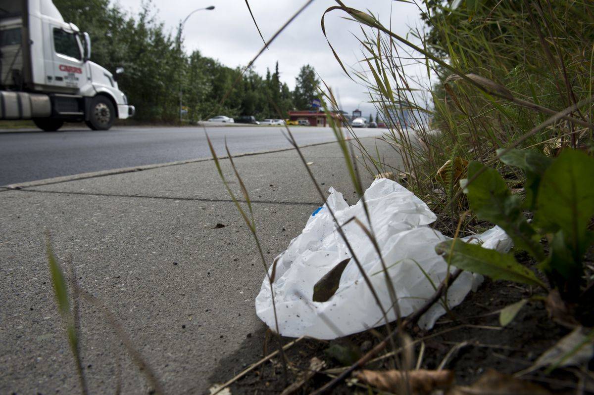 A plastic bag is discarded at the side of C Street in Midtown on August 15, 2018. (Marc Lester / ADN)