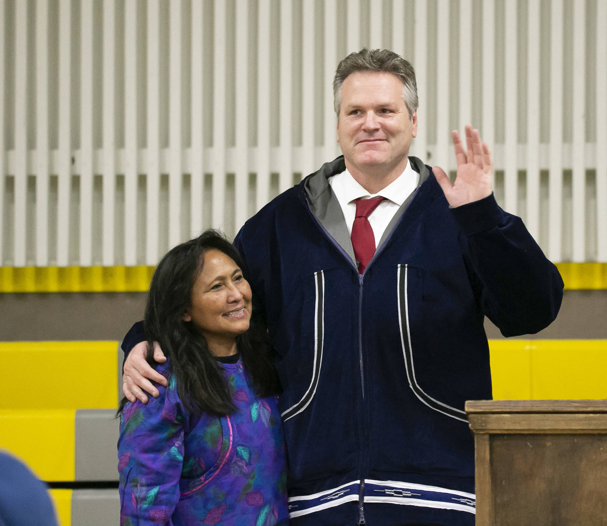 Alaska Gov. Mike Dunleavy poses with first lady Rose Dunleavy after he was sworn into office Monday, Dec. 3, 2018, in Kotzebue, Alaska. He had originally planned the ceremony in her hometown of Noorvik, Alaska, but poor weather prevented his plane from landing there and the ceremony was moved to Kotzebue.(Stanley Wright/Alaska Governor’s Office via AP)