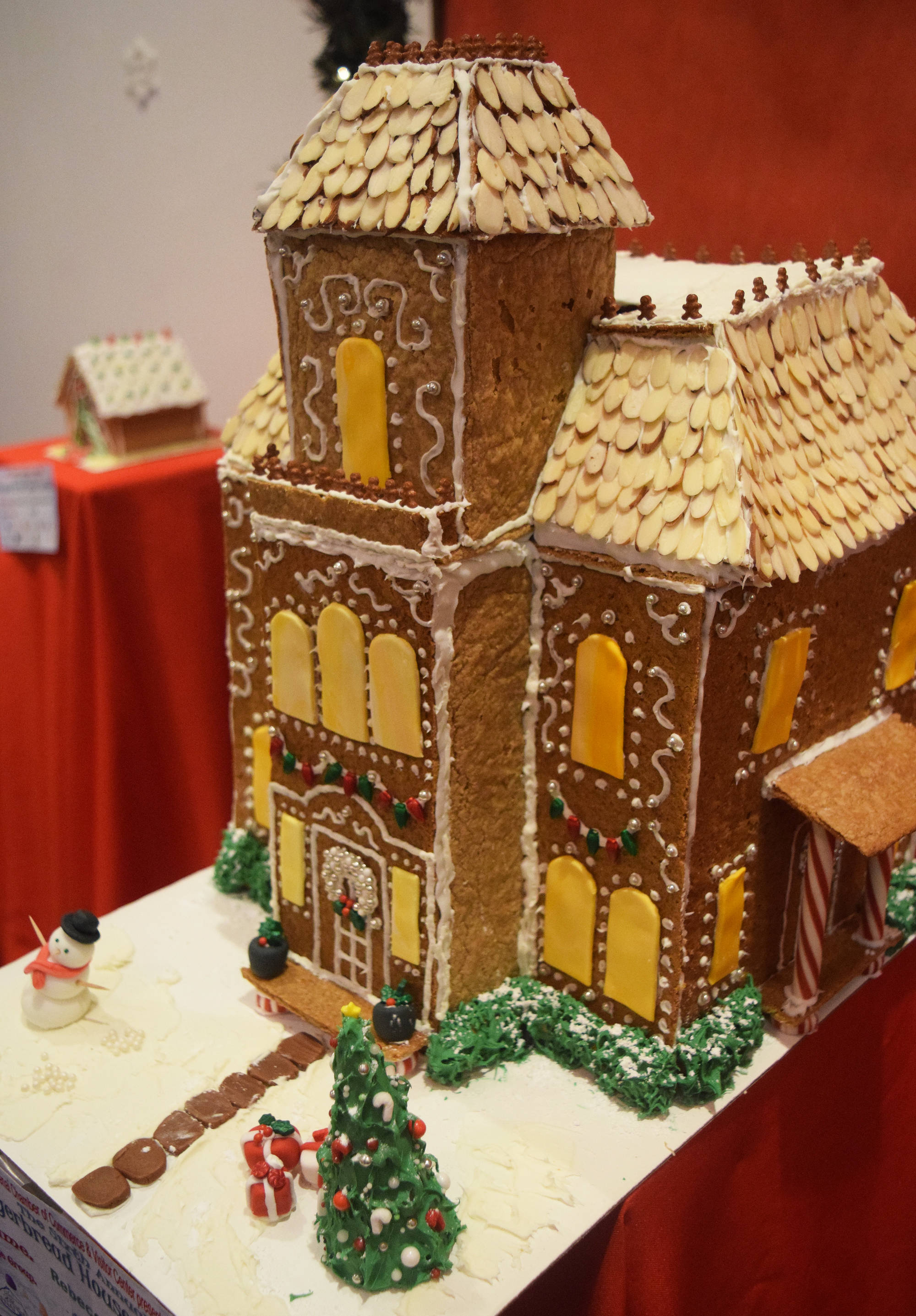 A gingerbread house entry by Abigail Youngberg sits on display at the Kenai Chamber of Commerce and Visitor Center as part of its gingerbread house contest. The gingerbread houses will be on display until Dec. 21. (Photo by Joey Klecka/Peninsula Clarion)