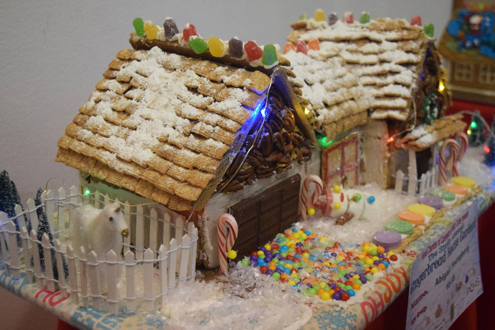 A gingerbread house entry by Abigail Youngberg sits on display in the Kenai Chamber of Commerce and Visitor Center gingerbread house contest. The gingerbread houses will be on display until Dec. 21 in the visitor center. (Photo by Joey Klecka/Peninsula Clarion)