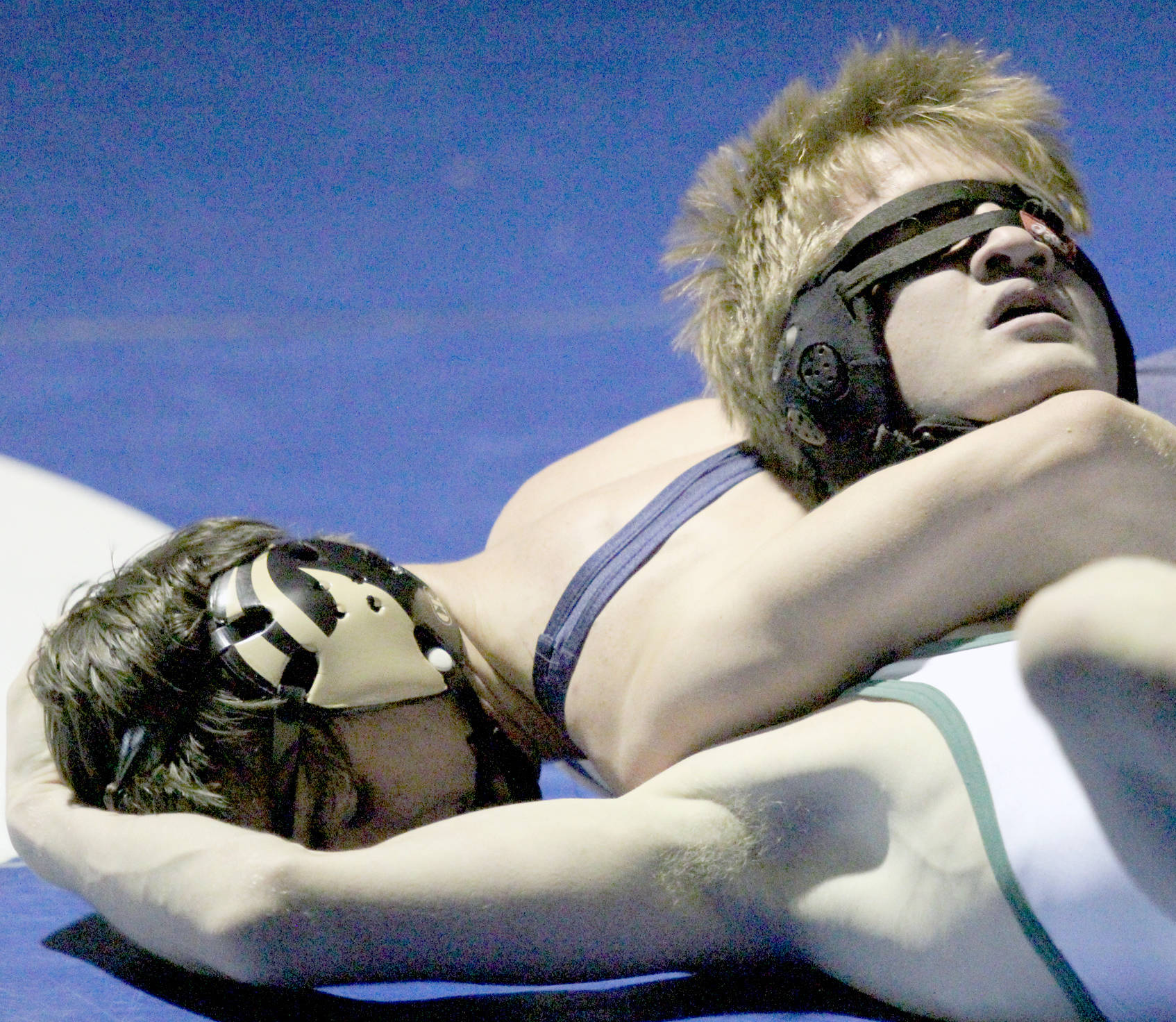 Soldotna’s Gideon Hutchison works to get near fall points against Colony’s Kayden Payne in the 130-pound final of the Northern Lights Conference meet Saturdy at Palmer High School. (Photo by Jeremiah Bartz/Frontiersman)