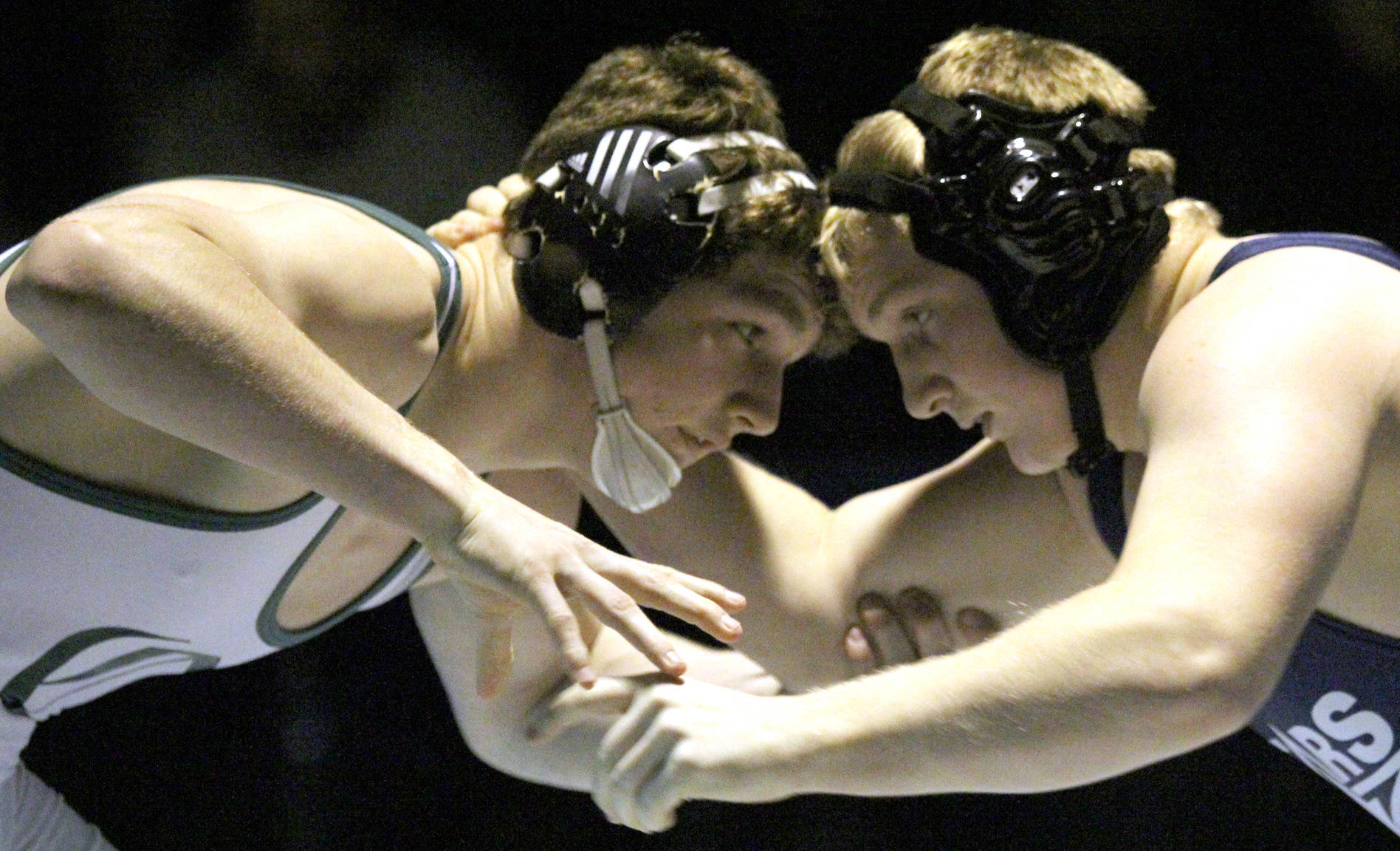 Colony senior Levi Hopkins battles Soldotna senior Brennan Werner early in the 189-pound title match of the Northern Lights Conference meet Saturday at Palmer High. (Photo by Jeremiah Bartz/Frontiersman)