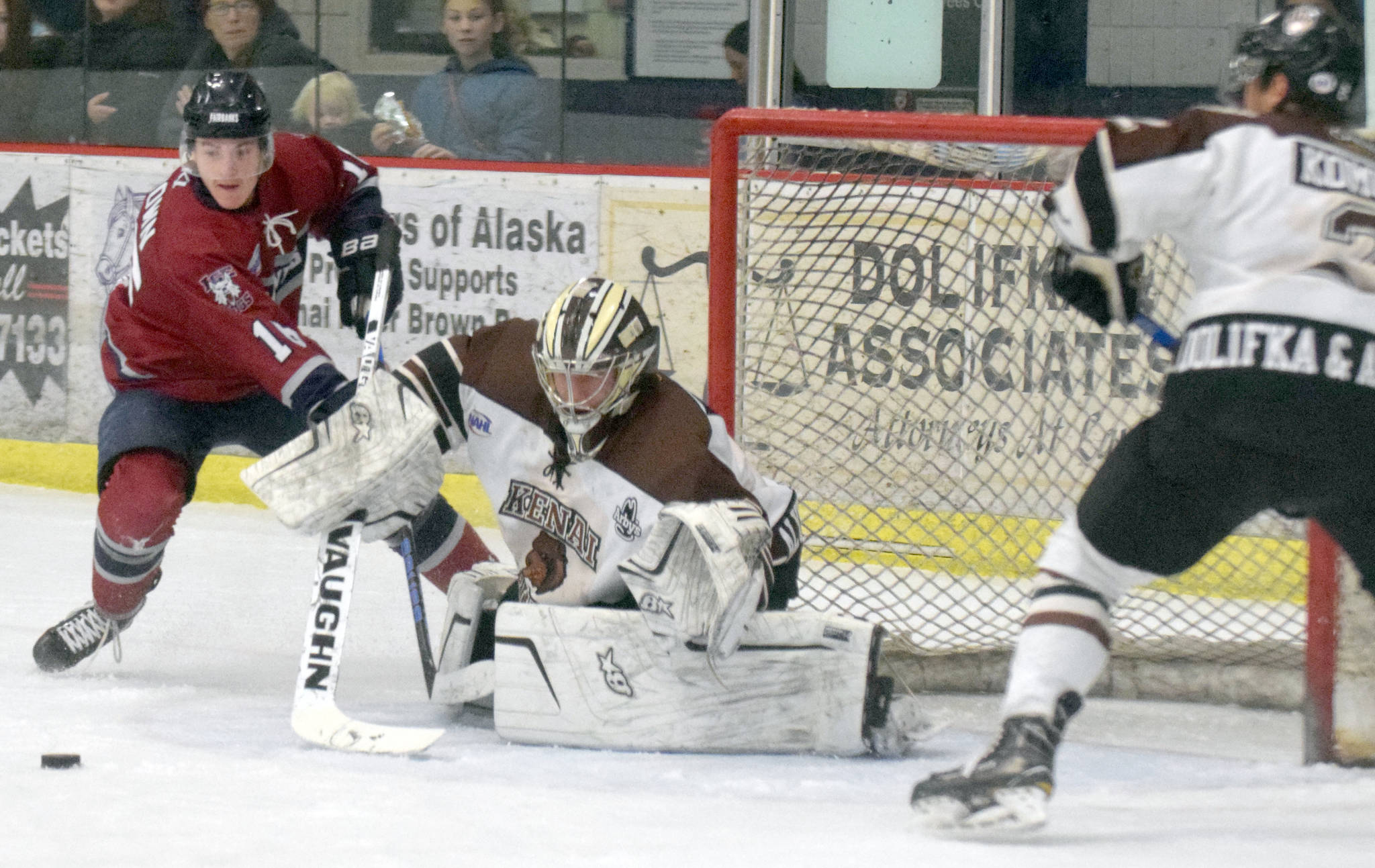 Kenai River Brown Bears goaltender Gavin Enright denies Fairbanks Ice Dogs forward Parker Brown on Sunday, Nov. 25, 2018, at the Soldotna Regional Sports Complex. (Photo by Jeff Helminiak/Peninsula Clarion)