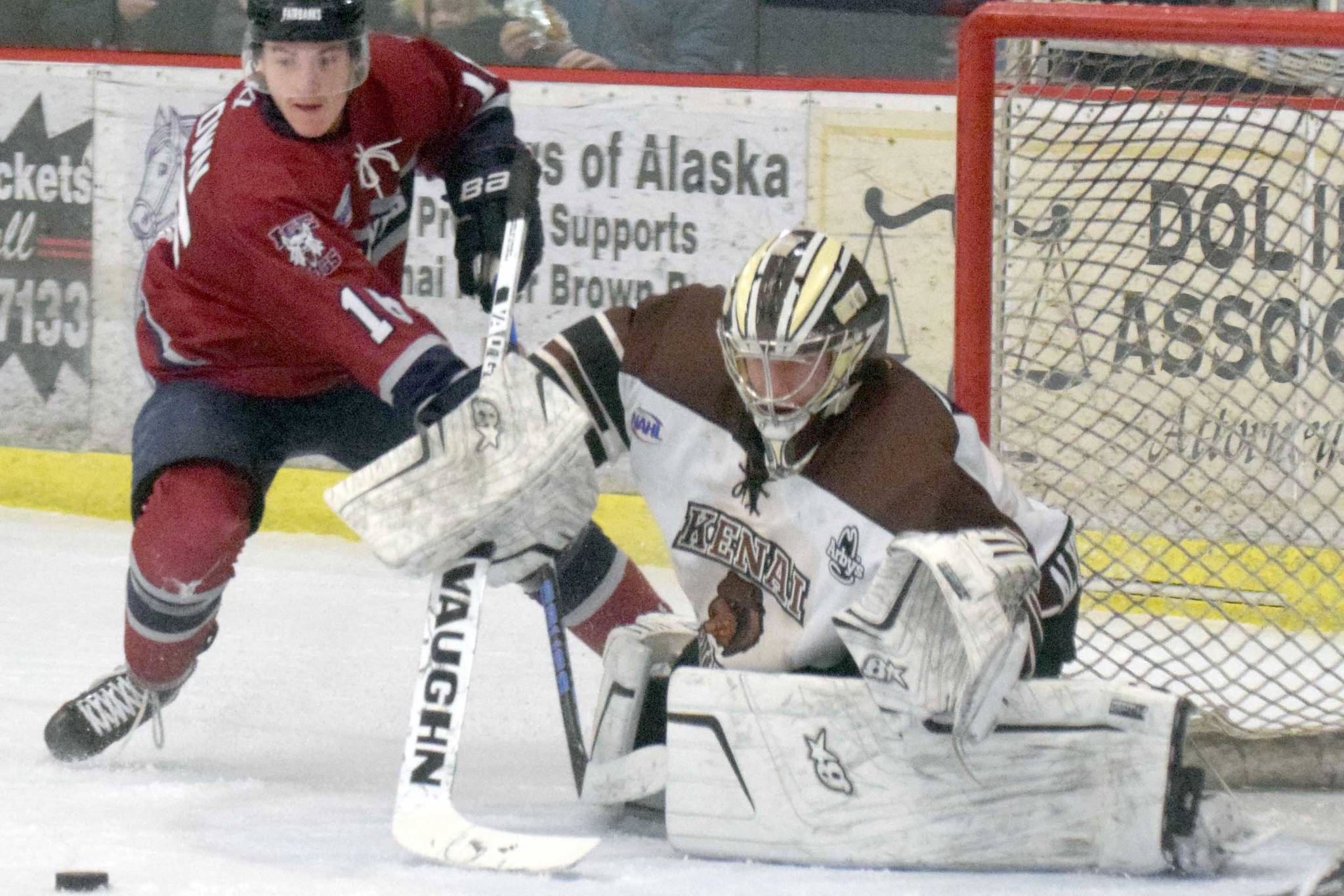 Kenai River Brown Bears goaltender Gavin Enright denies Fairbanks Ice Dogs forward Parker Brown on Sunday, Nov. 25, 2018, at the Soldotna Regional Sports Complex. (Photo by Jeff Helminiak/Peninsula Clarion)