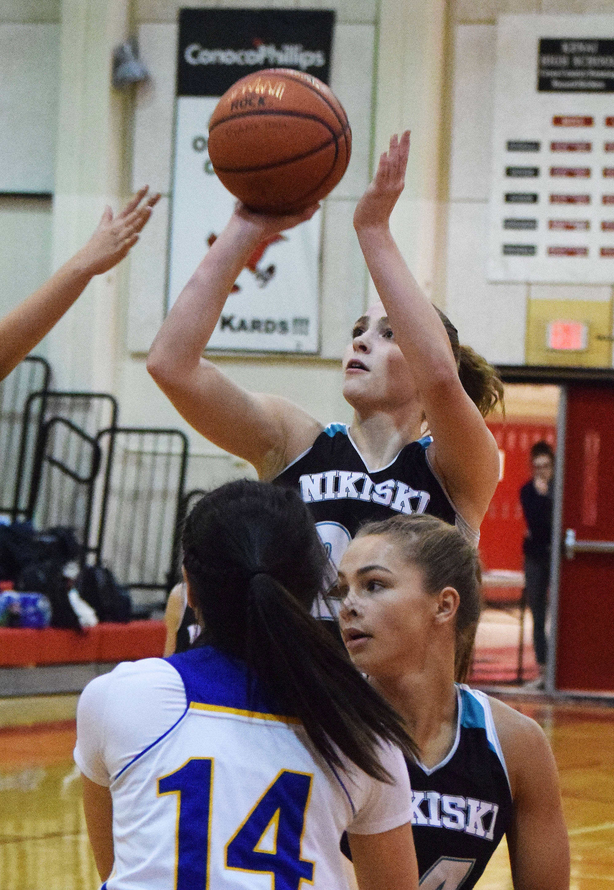 Nikiski senior Bethany Carstens goes up for a shot Thursday against Kotzebue at the Craig Jung Kenai River Challenge at Kenai Central High School. (Photo by Joey Klecka/Peninsula Clarion)