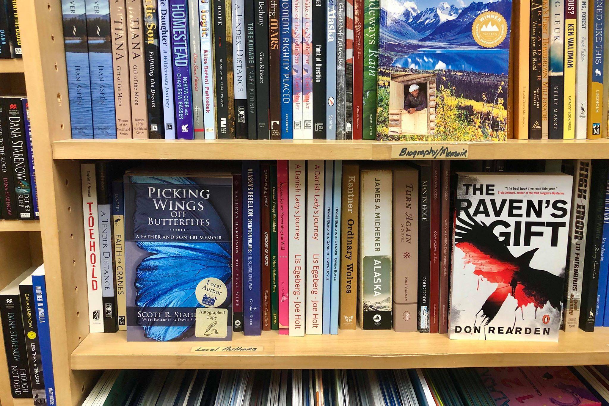 At River City Books, shoppers can easily find books written by local authors by perusing the local author shelf in the store’s Alaska section, on Friday, Dec. 14, 2018, in Soldotna, Alaska. (Photo by Victoria Petersen/Peninsula Clarion)